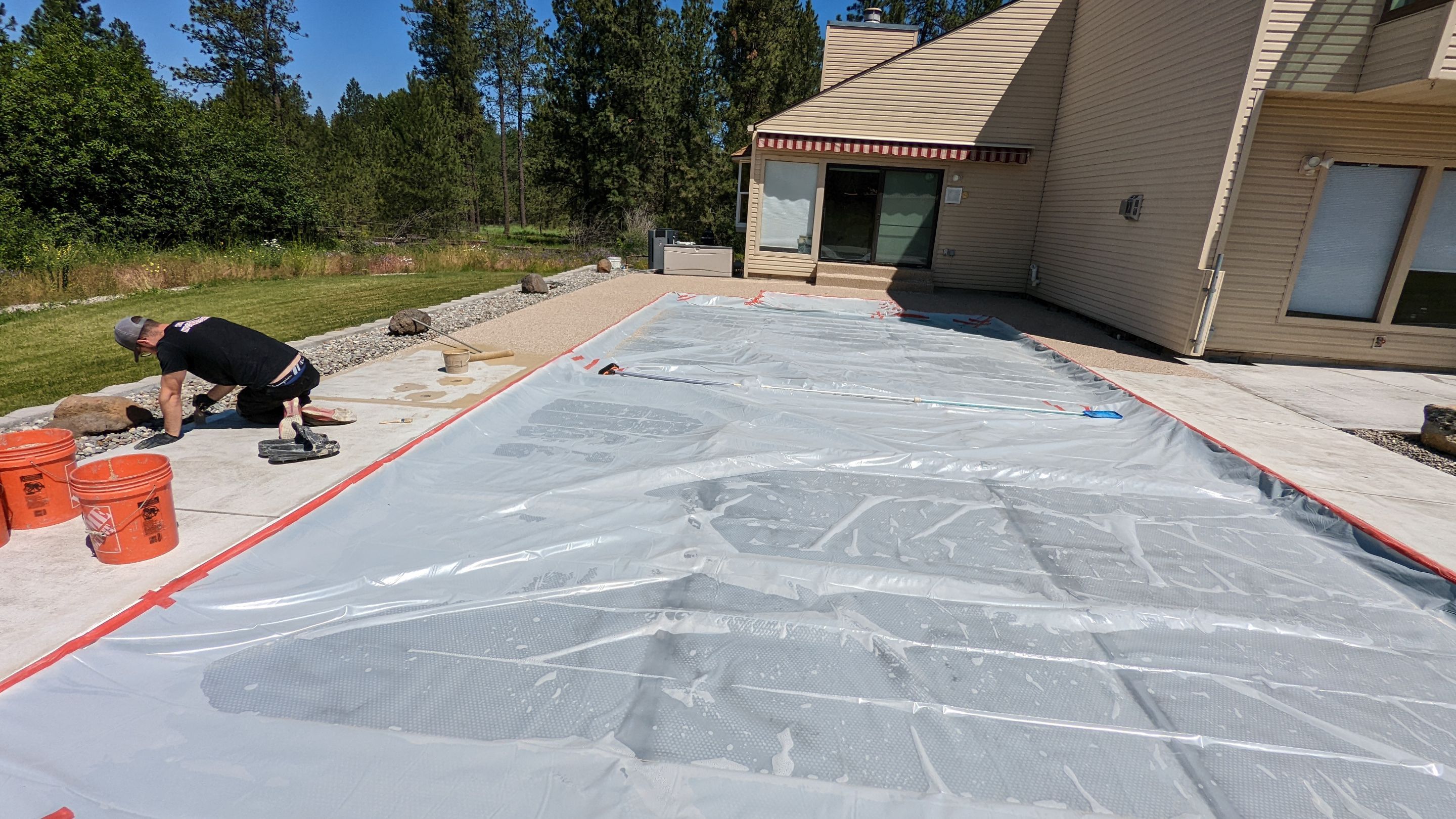 Garage Transformation using Domino for Garage and Pecan for Pool Deck by Croc Coatings, LLC