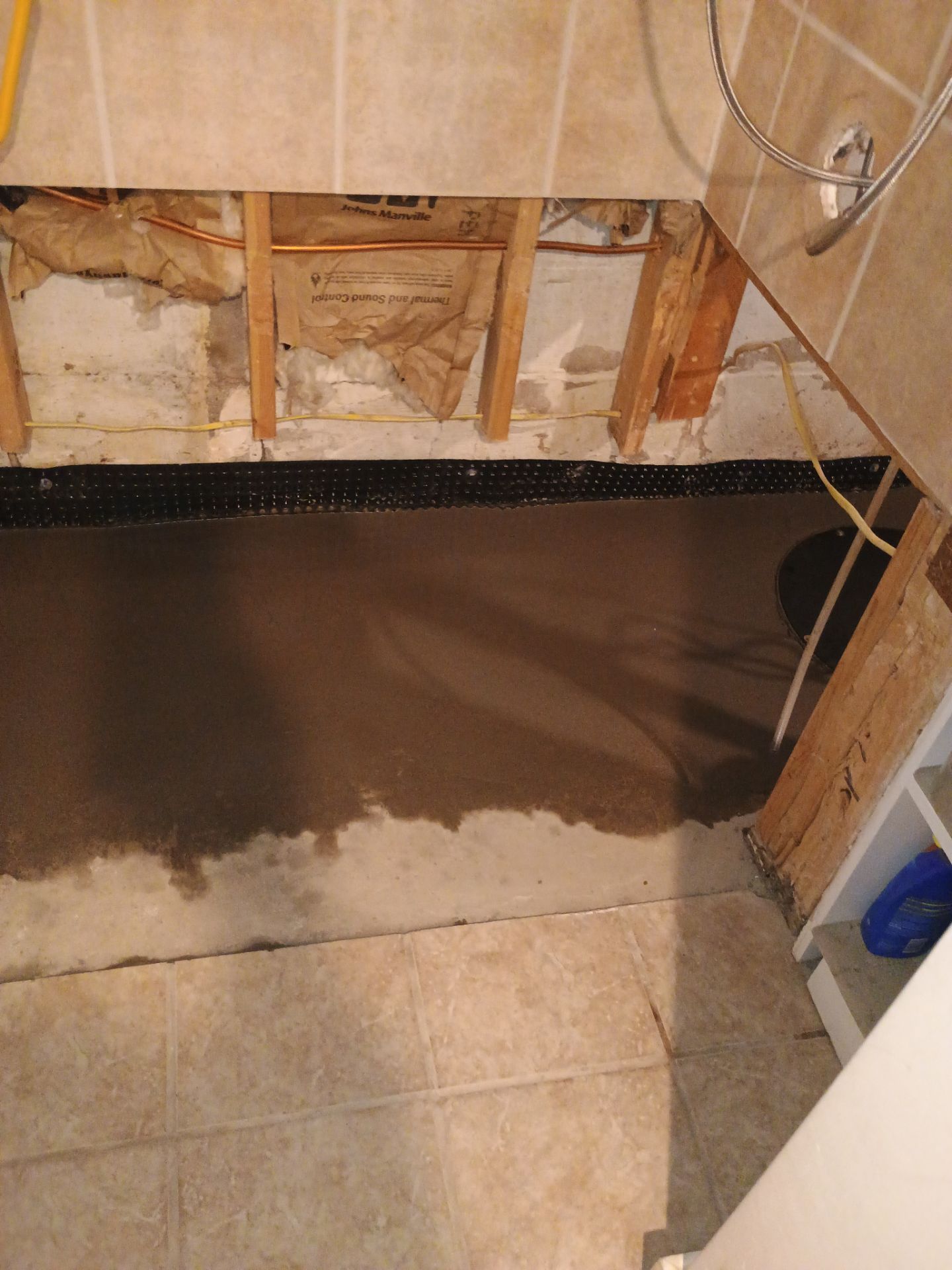 Drain Tile in Minneapolis for Kristen & Taylor by Waterproofing Northeast
