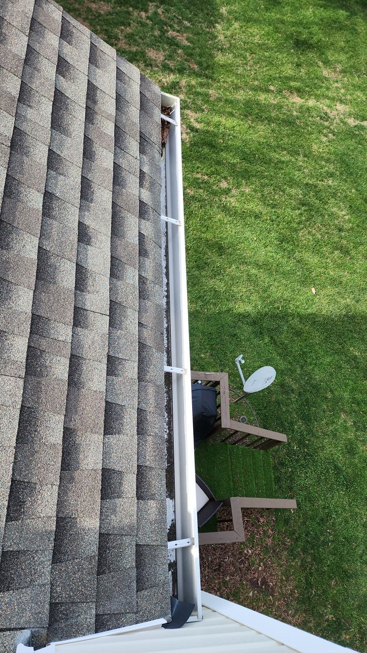 Gutter Cleaning using water by Power Wash Masters LLC