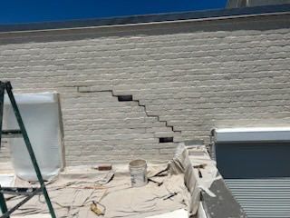 Off with the Tile and on with the TILCOR stone coated metal.  by Bayfront Roofing and Construction