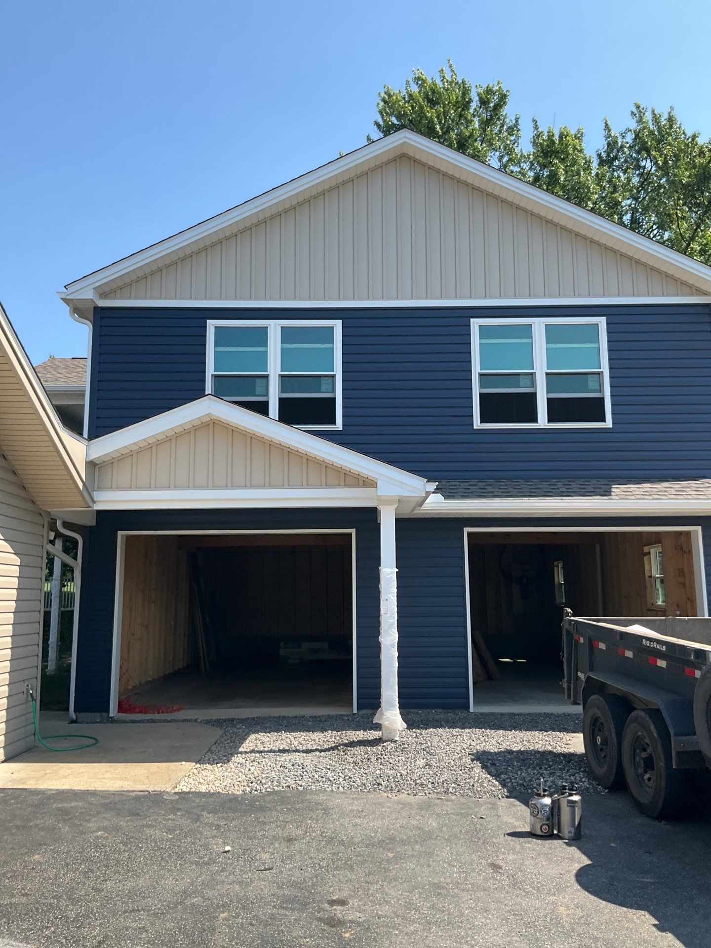 Two-Story Residential Addition and New Garage in Hummelstown by Esh Builders