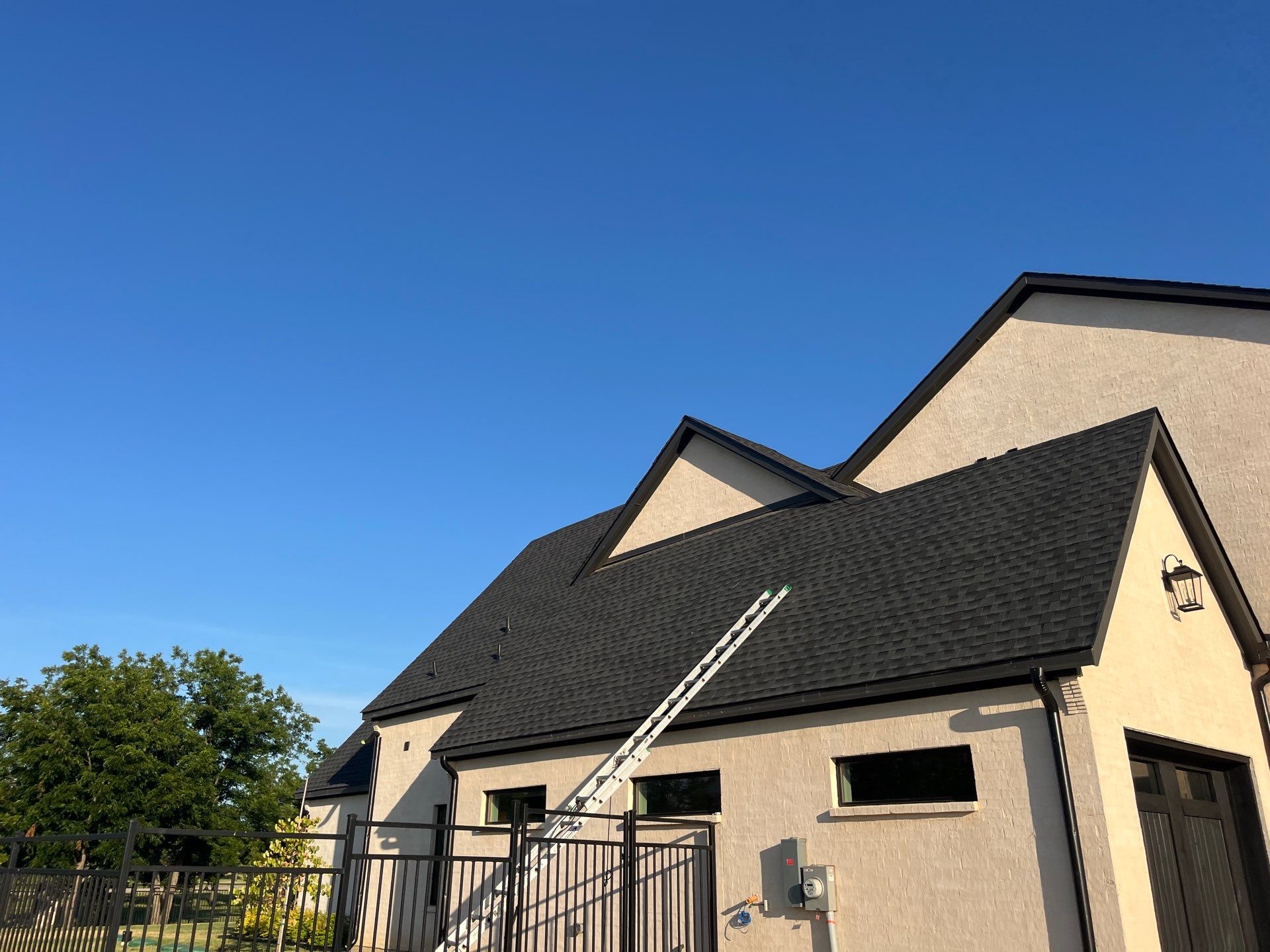 GAF-Charcoal with White Brick  by Tejas Roofworks + Restoration