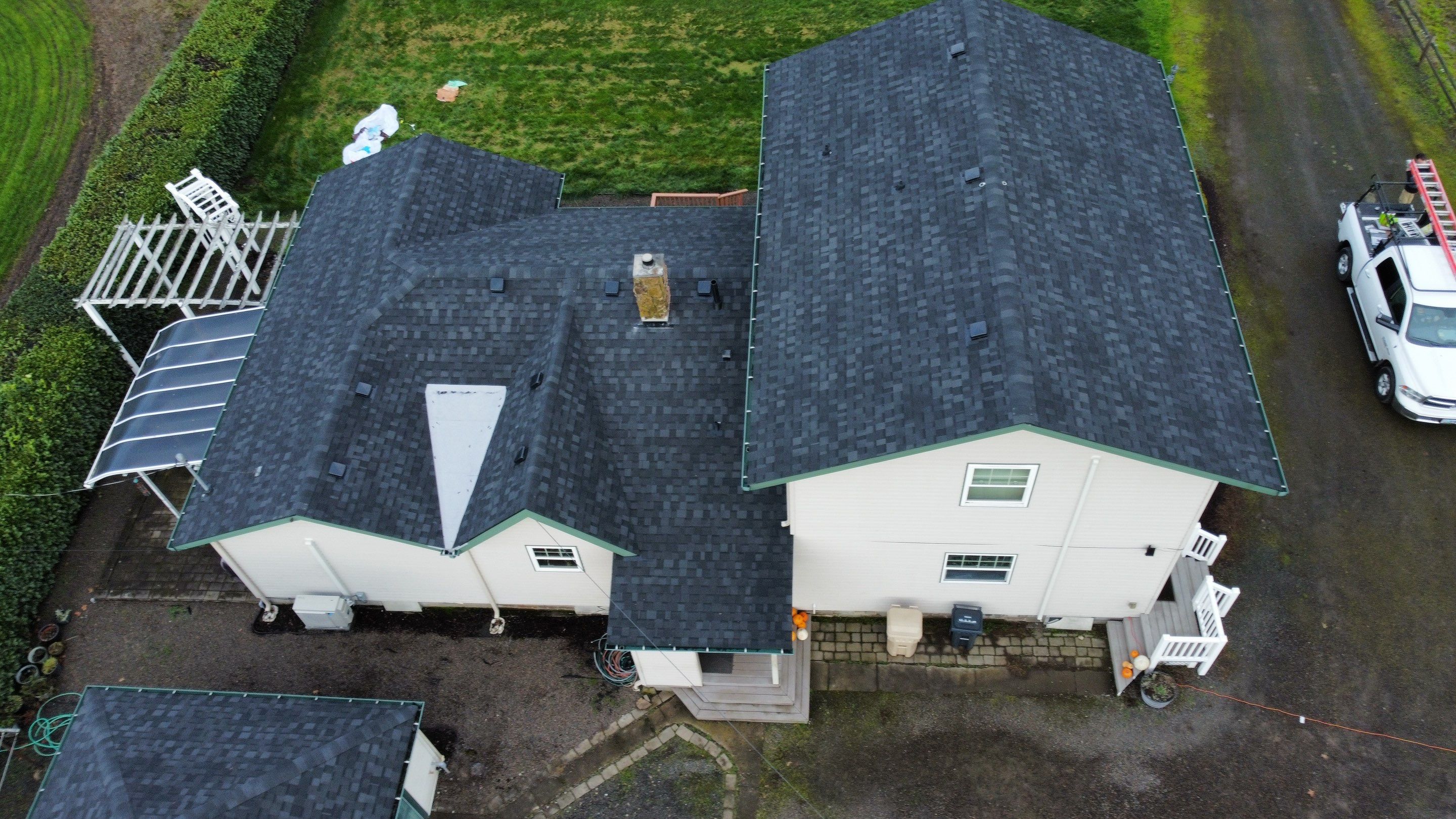 Residential Roofing Installation using IKO Dynasty (Color: Granite Black) by Orezona Building & Roofing Company, Inc.