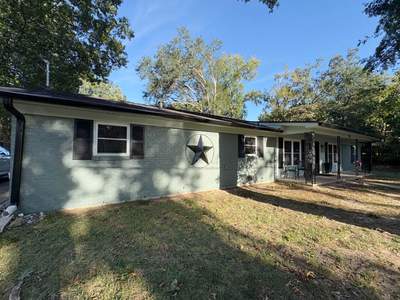 From Basic Brick to Bold Sage Green in Tyler, TX! Quality Coats Painting