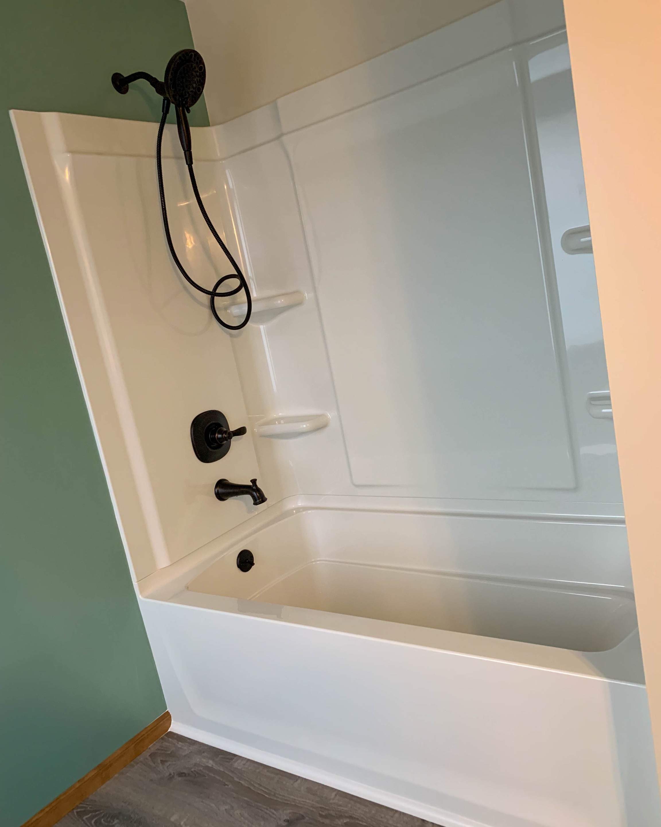 Bathroom Remodel using Shower Kit by Villegas Remodeling, LLC