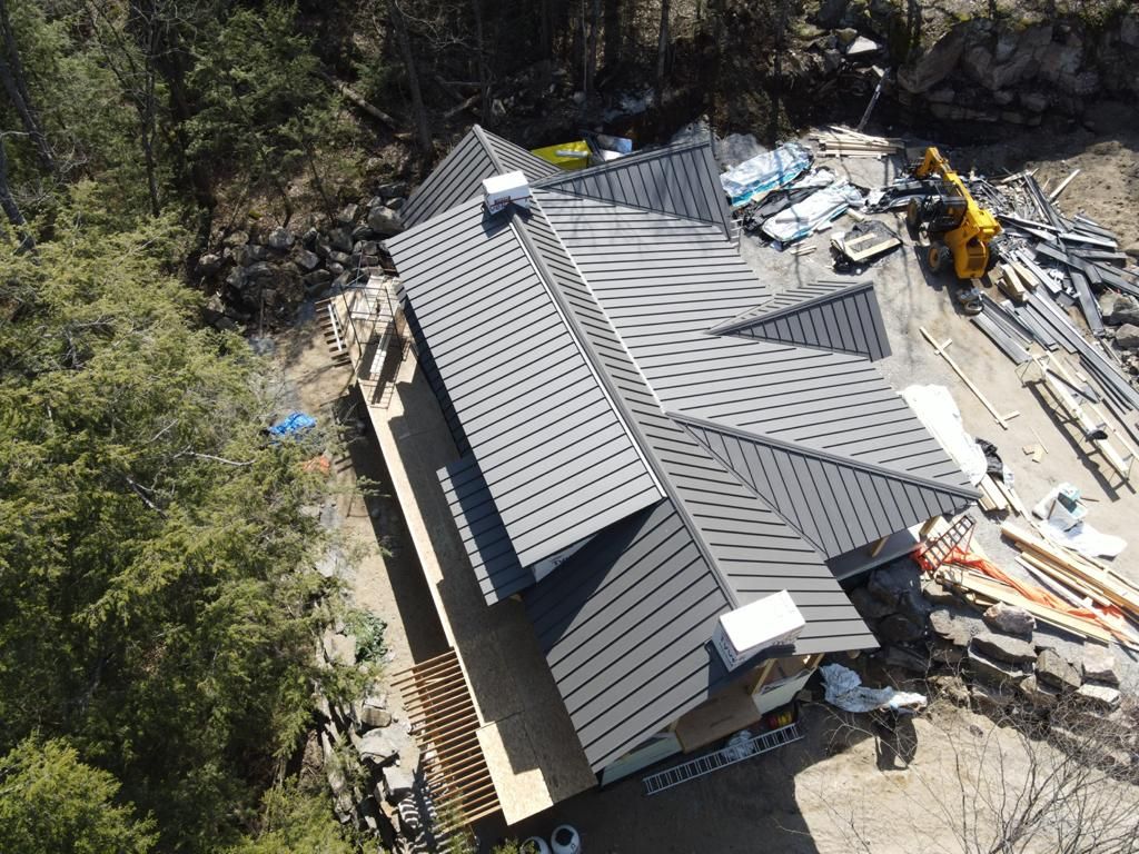 New Home Construction using 16" Standing Seam Panels by Jay Carter Roofing & Sheet Metal