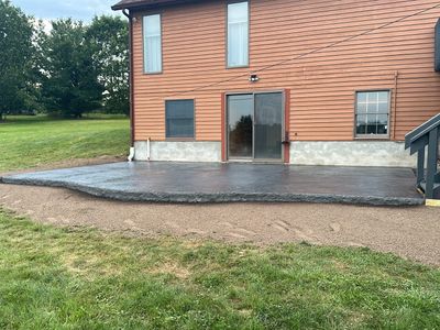 Bluestone textured concrete stamped patio 