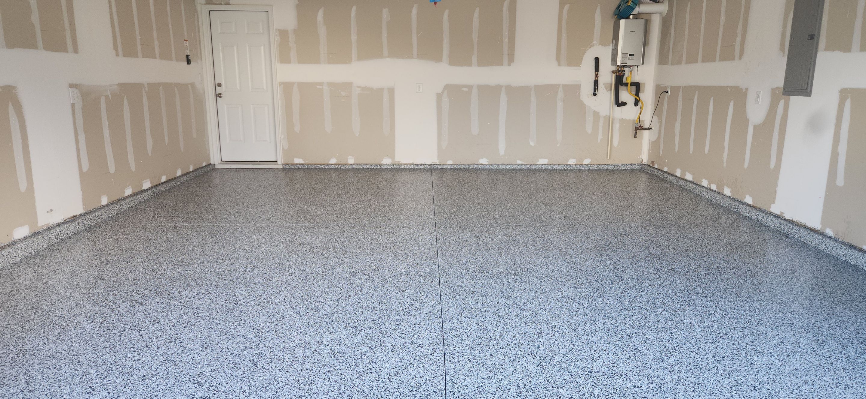 Garage & Back Patio using Domino & Pumice by Elite Floor Solutions