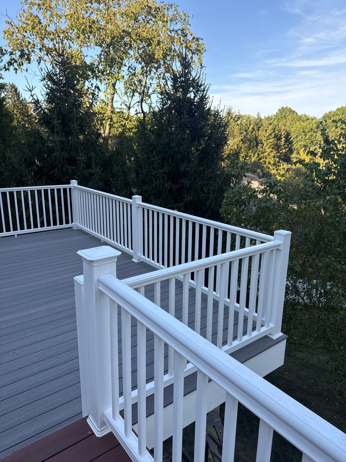 Deck extension  by Cousins Roofing Siding & Decks