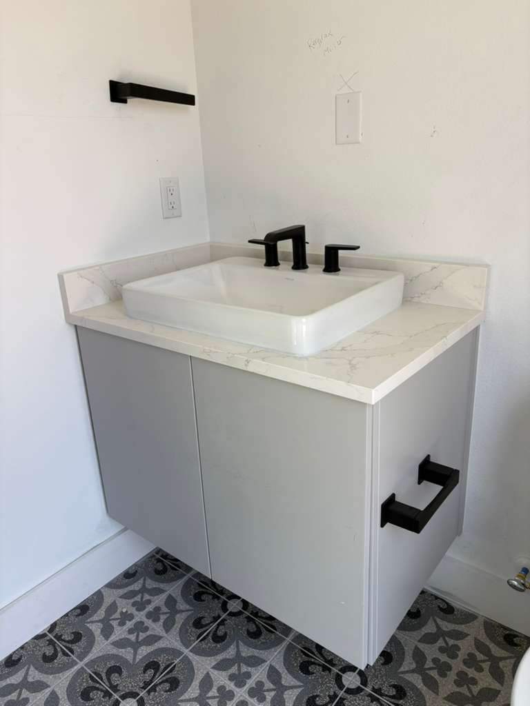 A home with a mix of quartz options by Mena stone surfaces