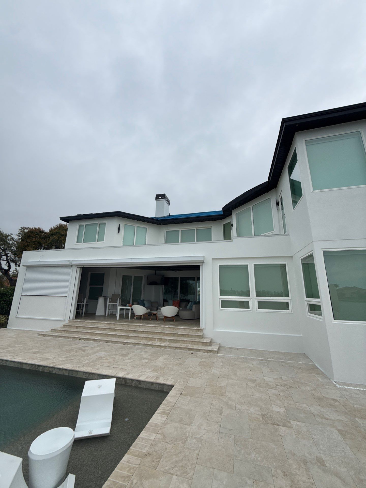 Soffit and Fascia Installation and black seamless gutters in Sarasota FL by Gutter Professors