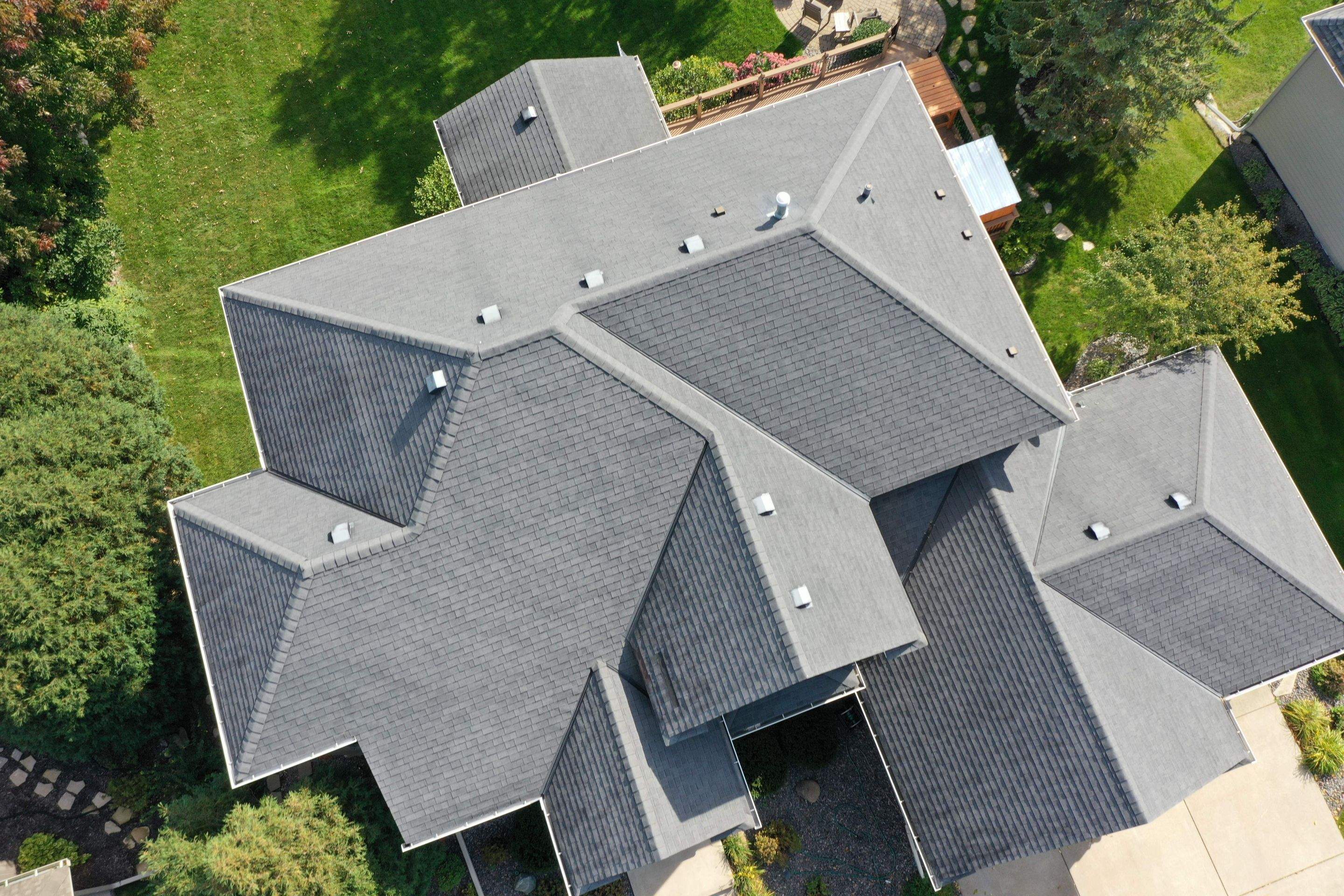 Residential Roofing Installation using Certainteed Landmark Moire Black by MODERN EXTERIOR SYSTEMS