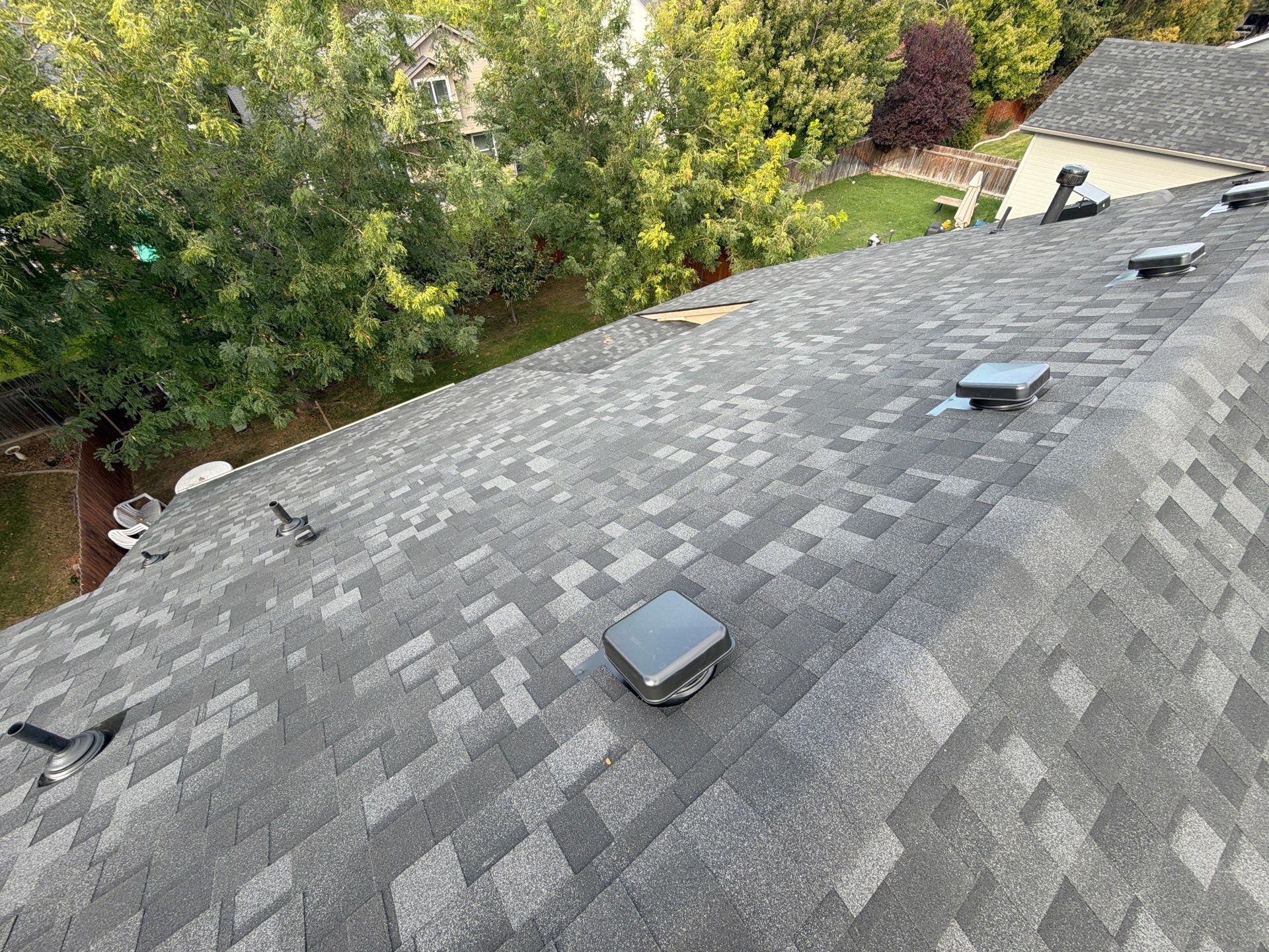 Residential Roof Replacement in Meridian Featuring Charcoal Architectural Shingles by Olive Roofing