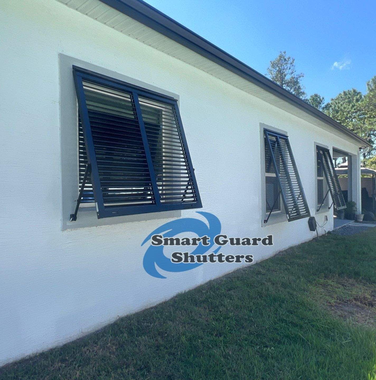 Impact Bahama Shutters in Jet Black by Smart Guard Shutters