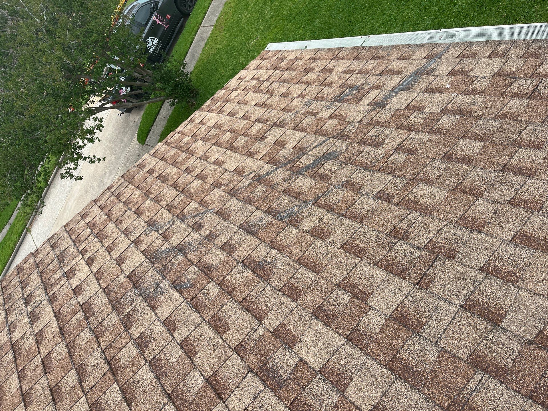 Hail Damage using Owen's Corning Duration (Lifetime) Shingles by Roof Repair Company