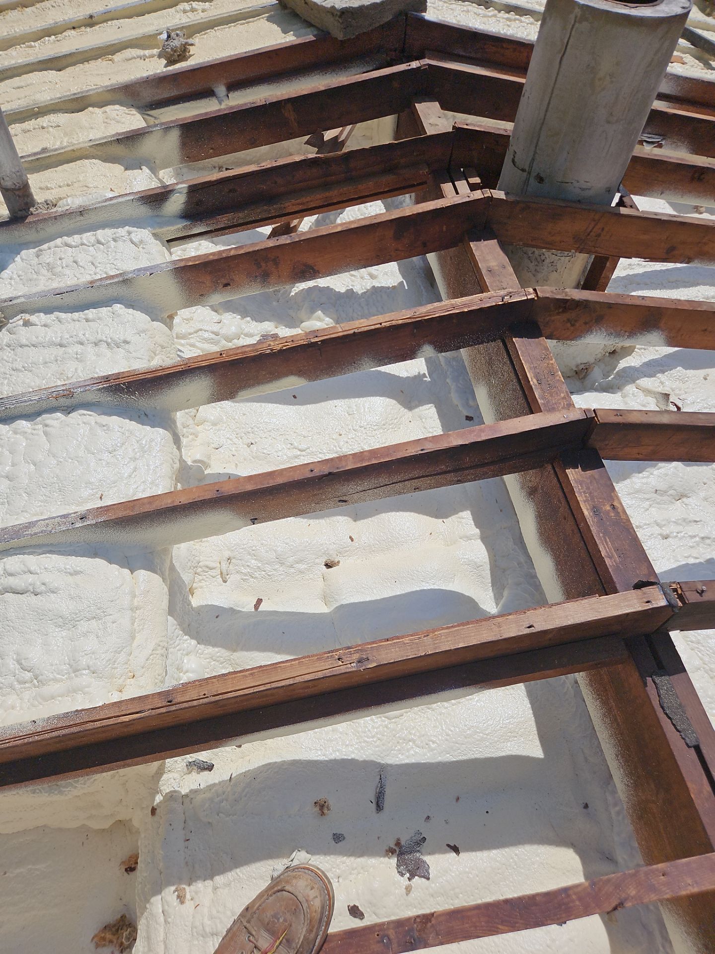 Exterior Installation using Closed Cell Spray Foam by NYS Foam & Energy
