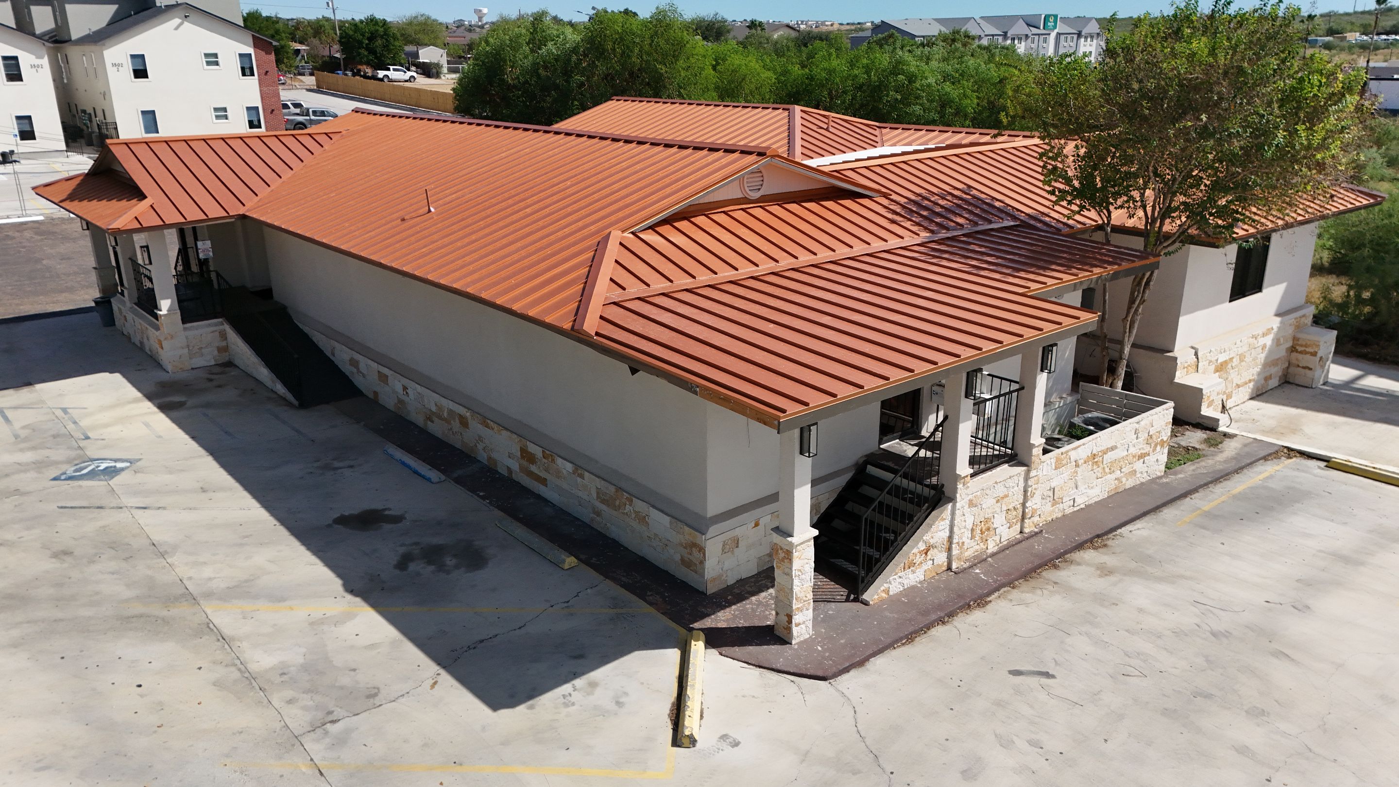 Copper Standing Seam Metal Roof Installation for Laredo Medical Clinic by JM Flores Roofing & Construction, Inc