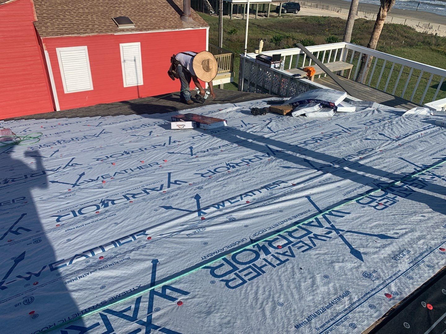 Galveston Waterfront Roof Installation In Progress by Elite Roofing LLC