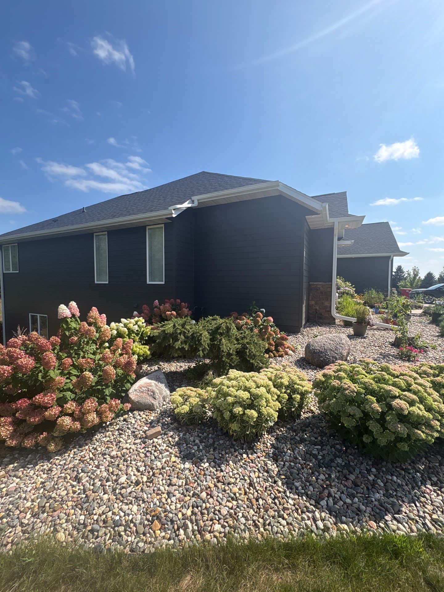 Sioux Falls Residential Exterior Painting and Siding Refresh by Select Painting, Coatings & Garage Cabinets