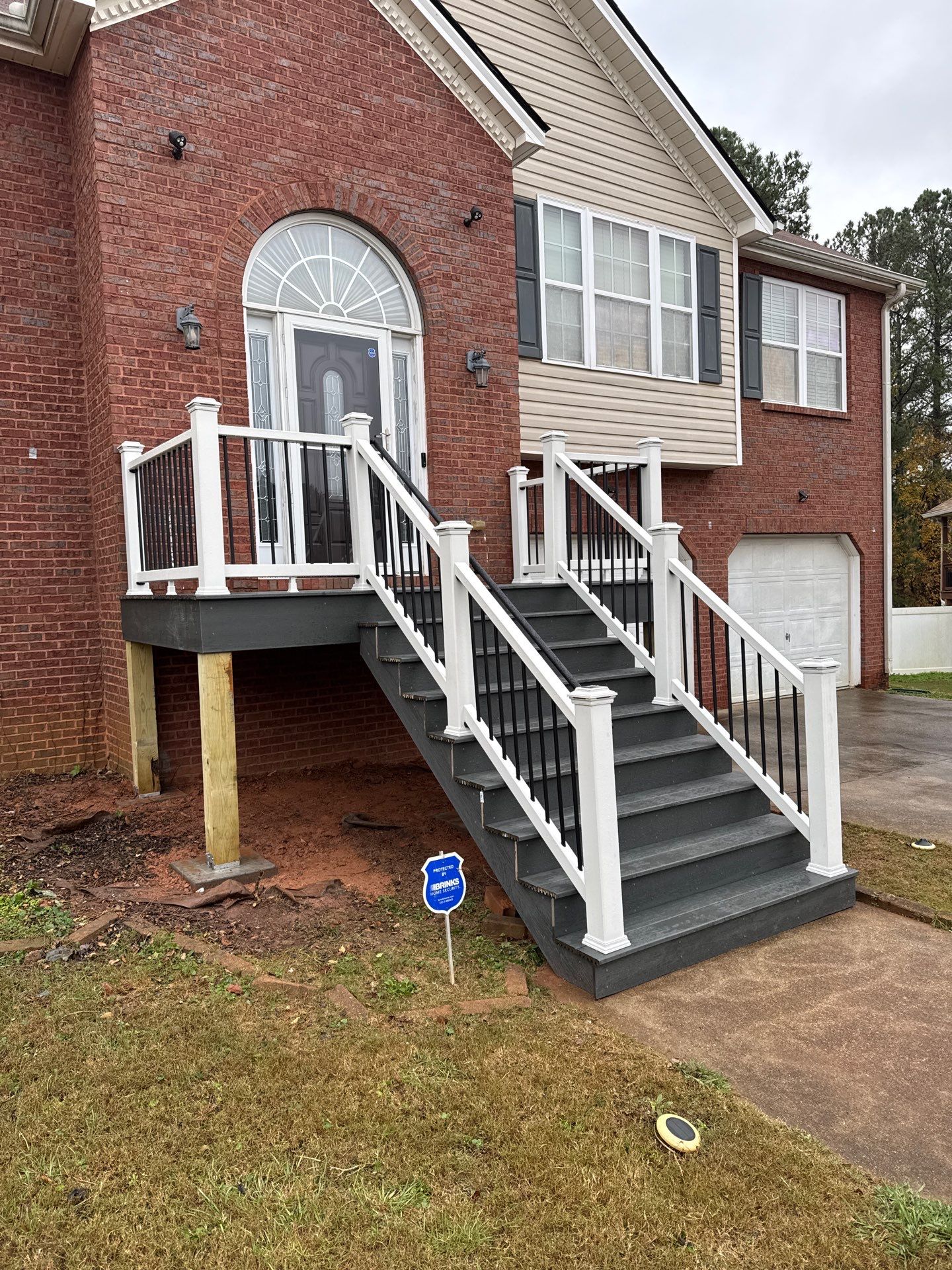 Modern Front Entry Deck and Staircase Renovation in Douglasville by Swift Home Renovations