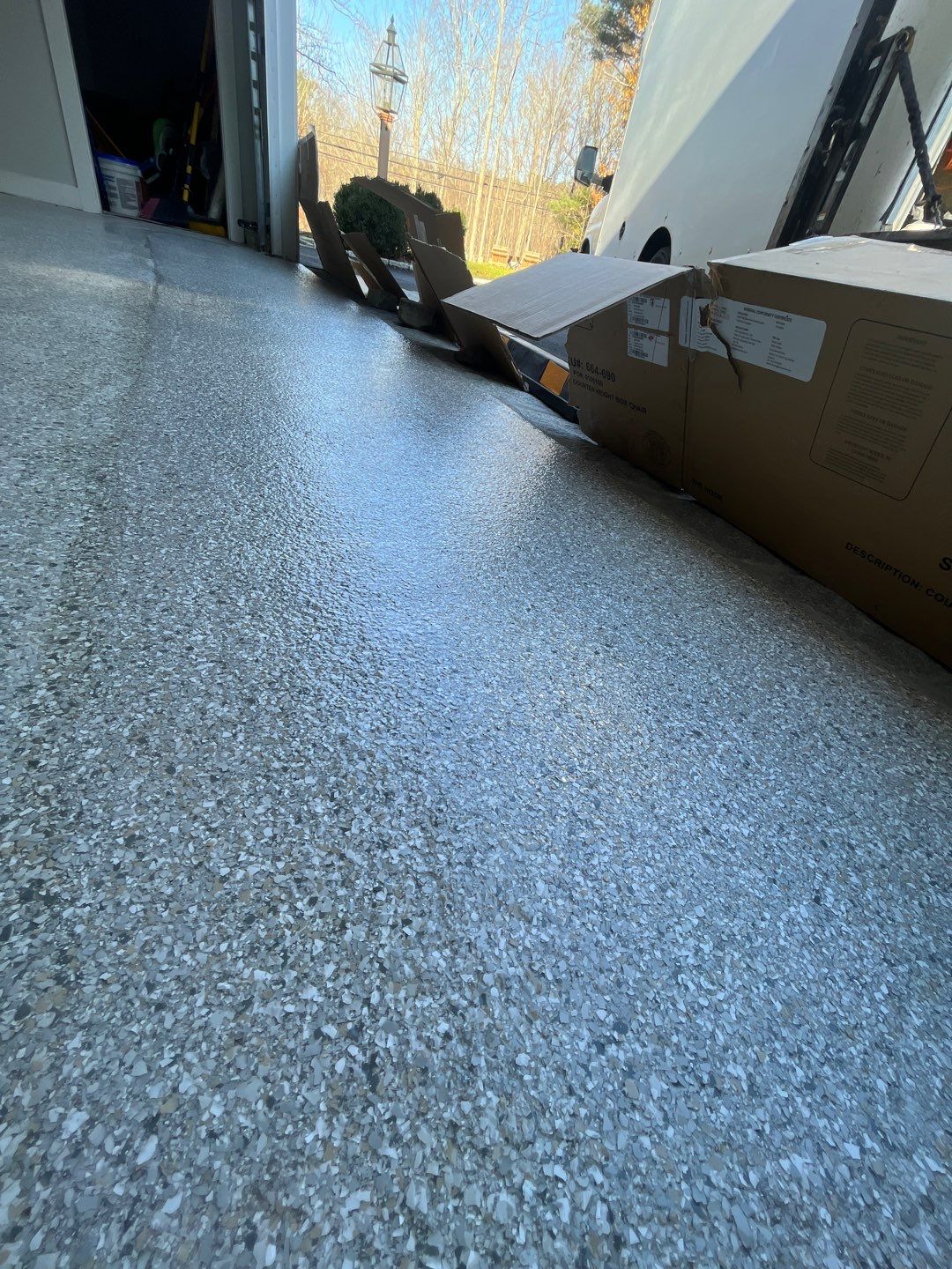 Garage in Sherborn, MA 01770 by Symphony Concrete Coatings