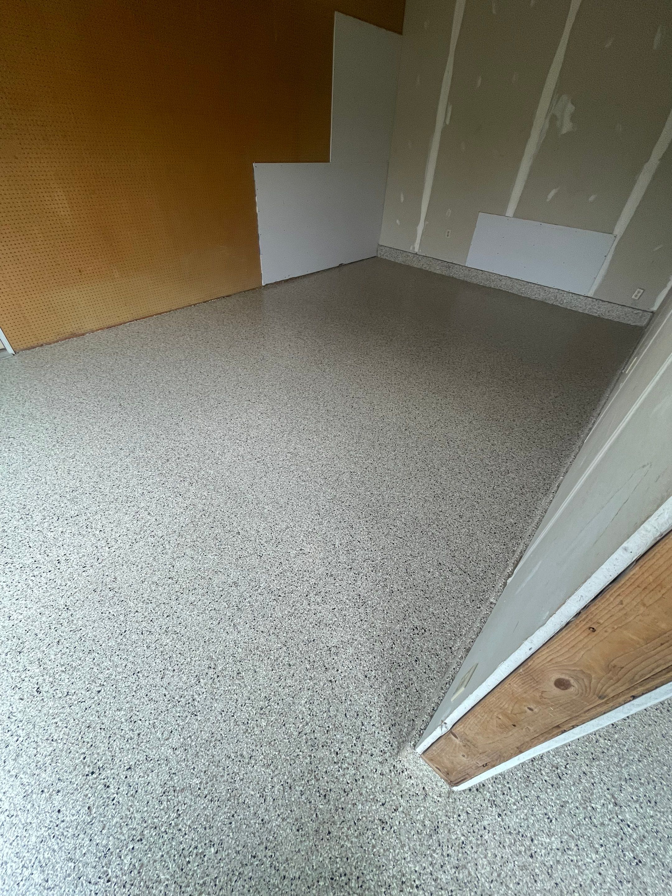 Speckled Epoxy Floor Coating Installation for Centerville Residential Garage by Select Painting, Coatings & Garage Cabinets