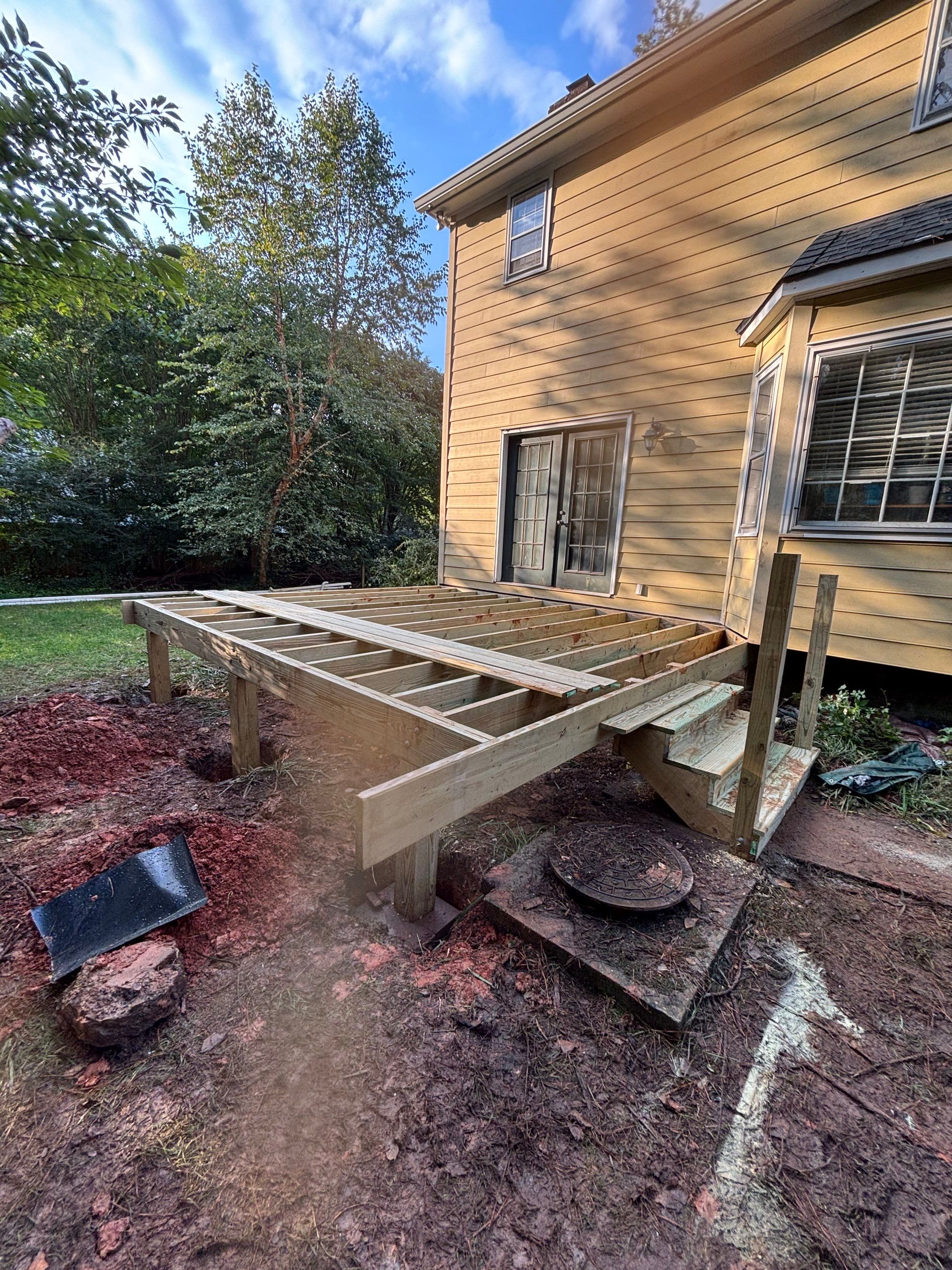 James Hardie Siding Replacement and Custom Deck Construction in Cary by The Remodeling Company