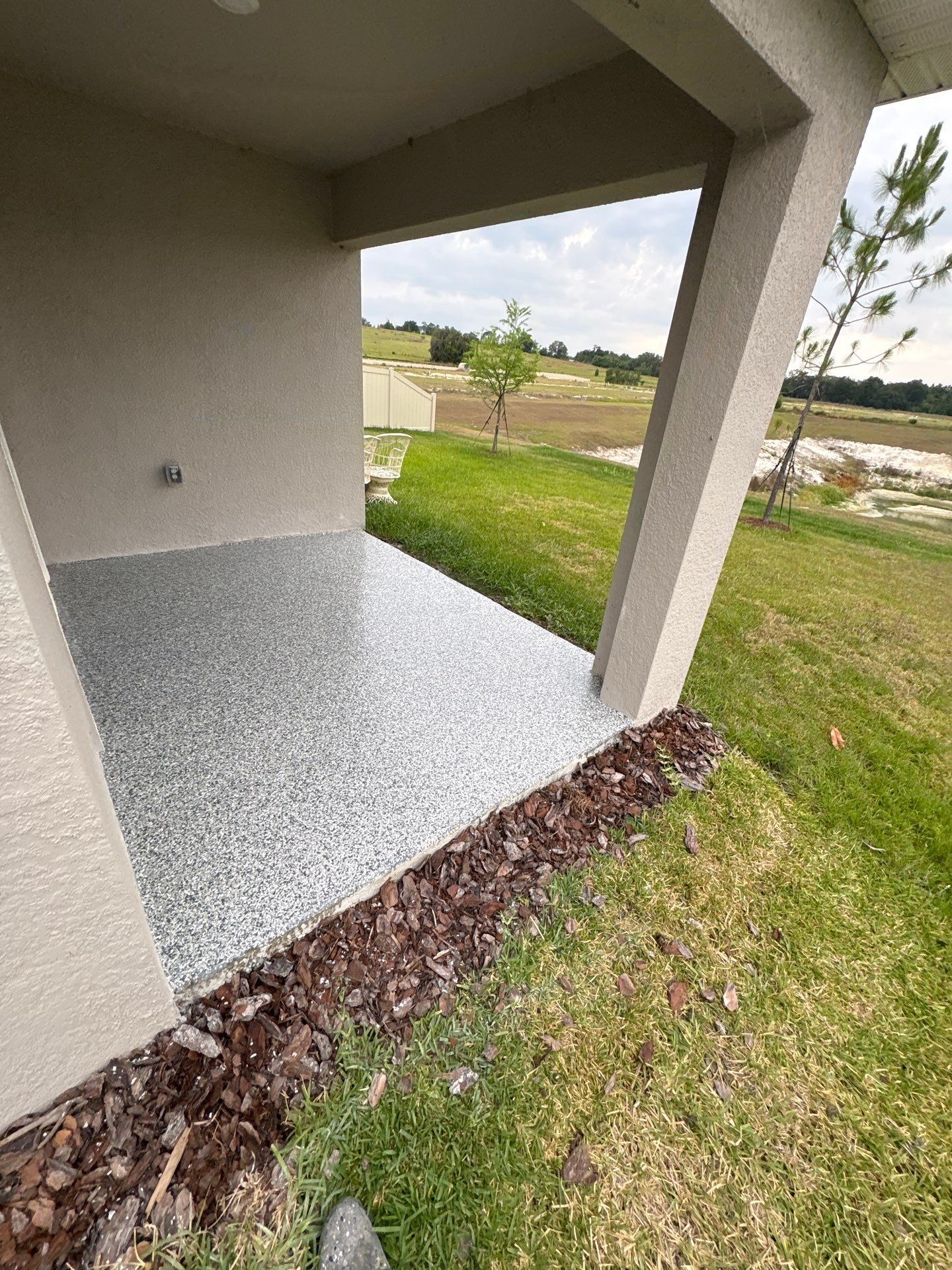 Zephyrhills, FL Epoxy Garage and Patio Floor Upgrade by Performance Floors & Coating