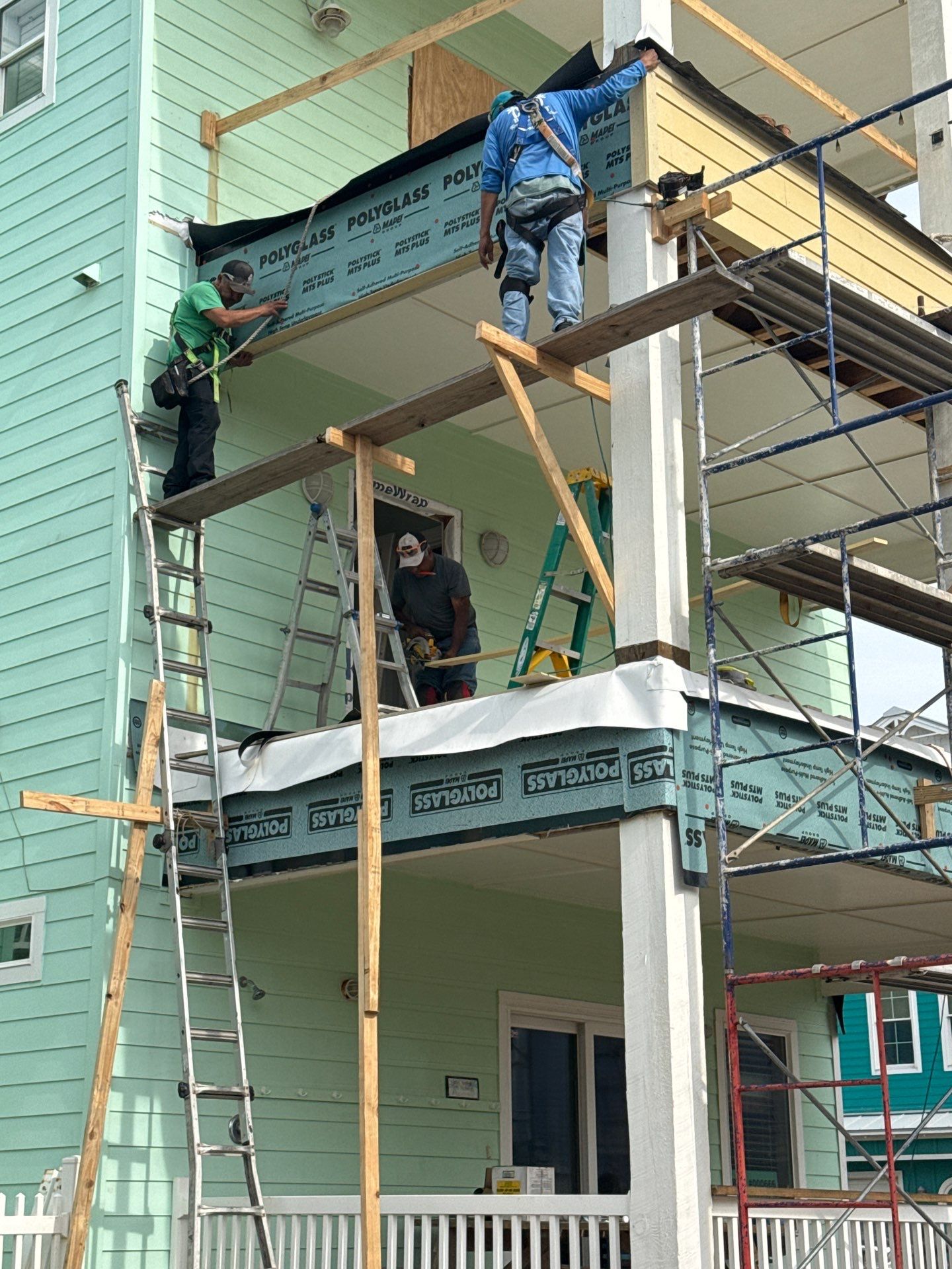 Walk Out Patio Cover by Bayfront Roofing and Construction