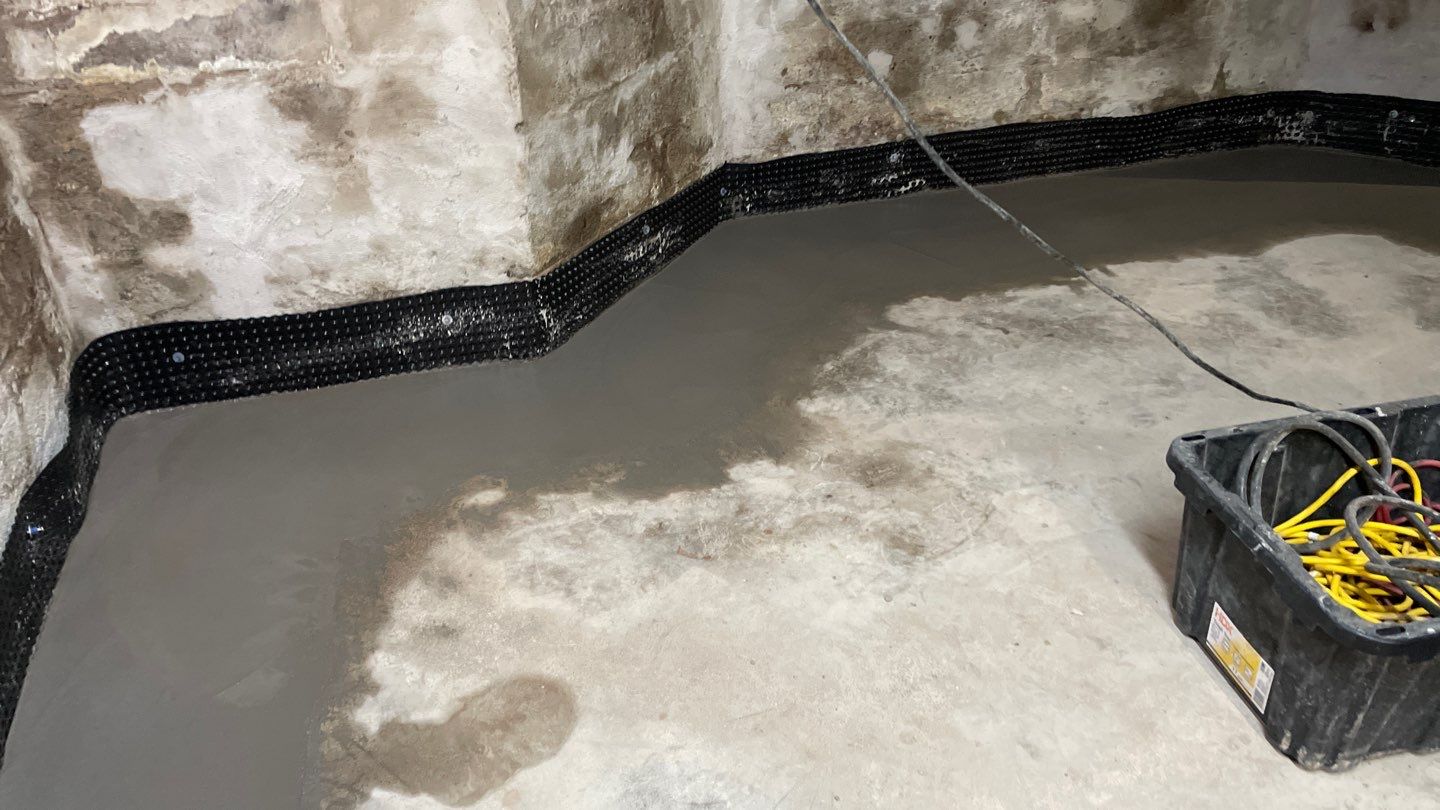 Interior Drain Tile & Foundation Crack Repair in Northeast Minneapolis by Waterproofing Northeast