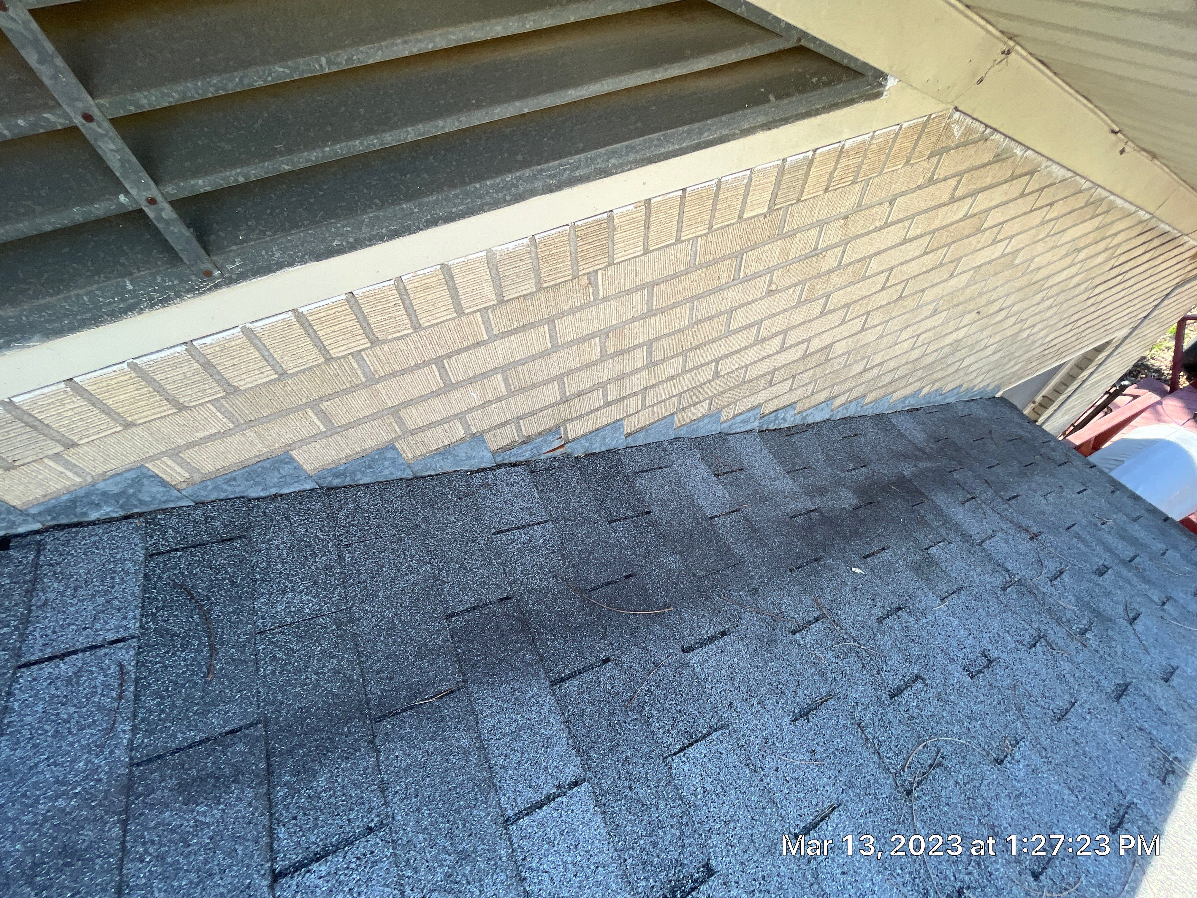 Residential Roofing Installation using 26 Gauge Colored Panels by Hostetler Roofing