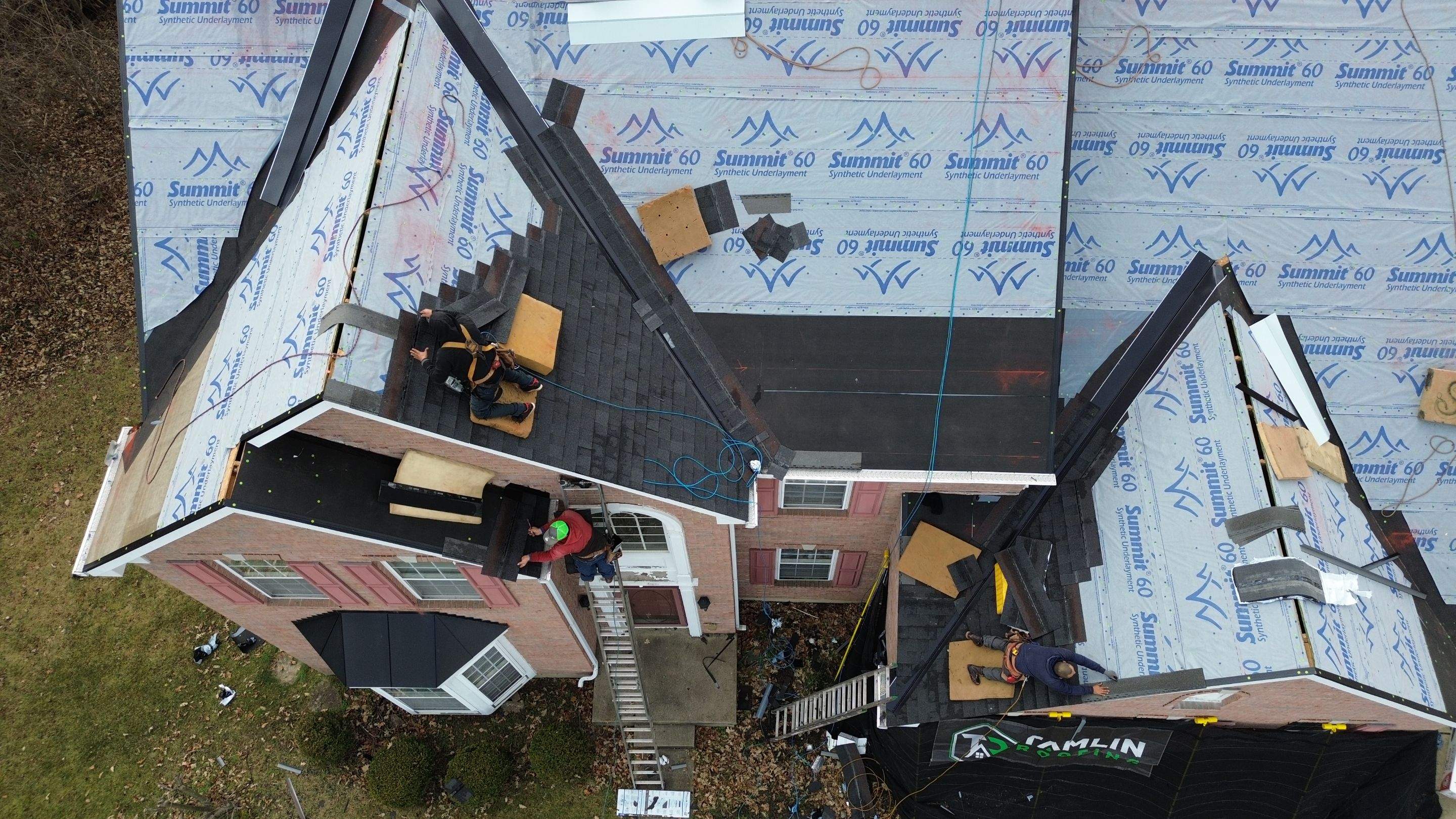 Walden Ponds - Pristine Black and Hydro Flo Gutter Guards by Tamlin Roofing