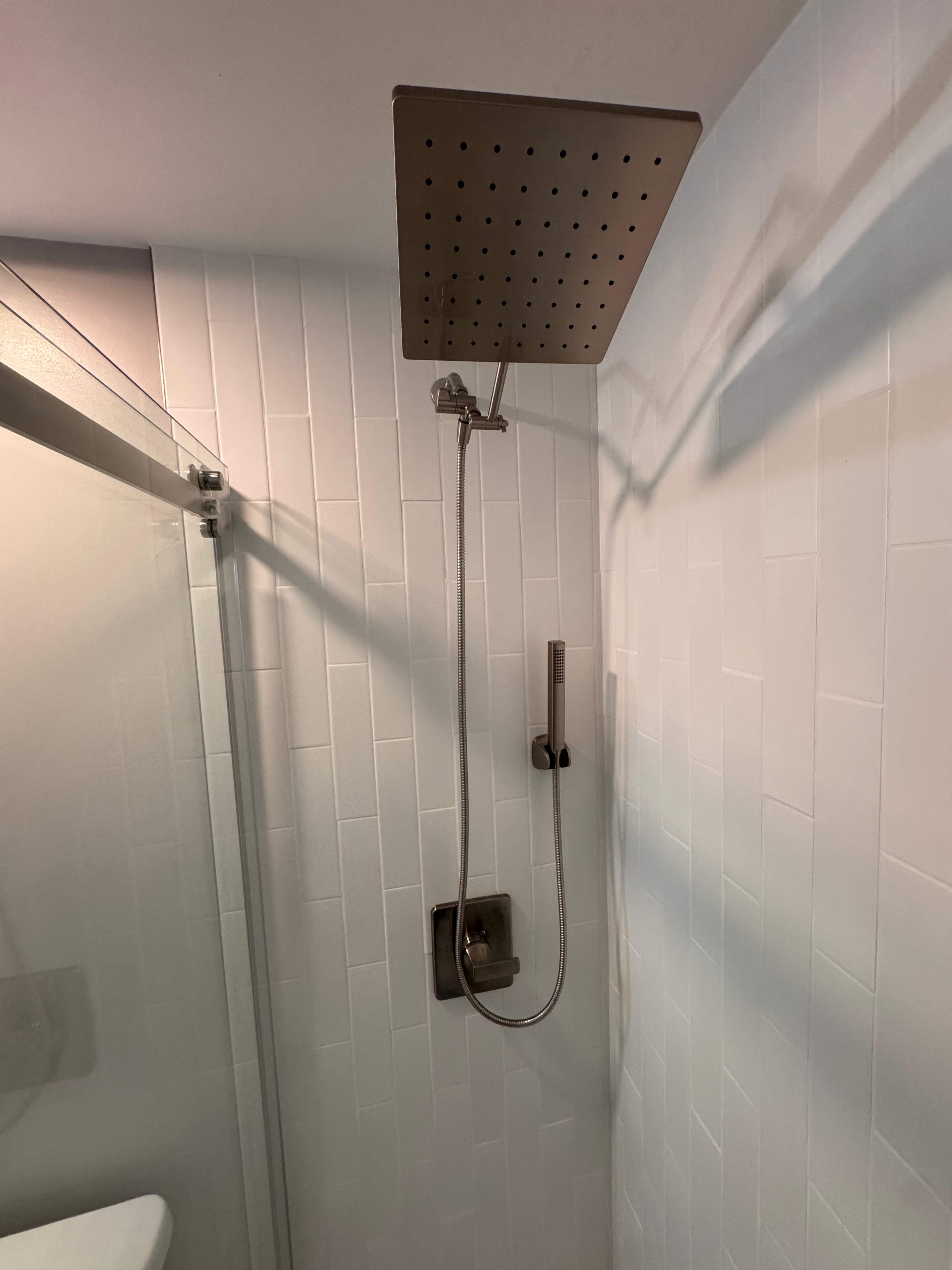 Tub to walk-in shower conversion by Prudencio