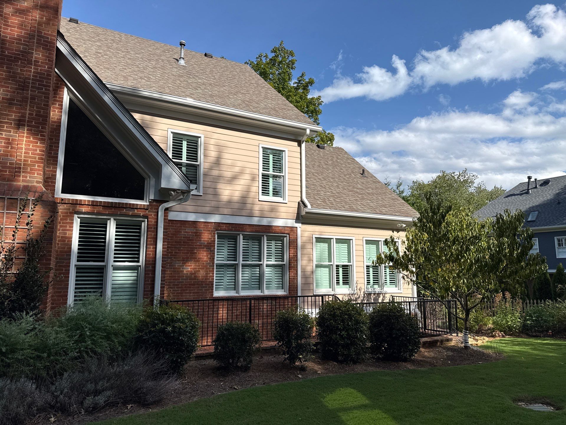 Atlanta, GA Siding and Rotted Wood Replacement, Plus Exterior Painting and Gutter Installation by Nelson Exteriors 