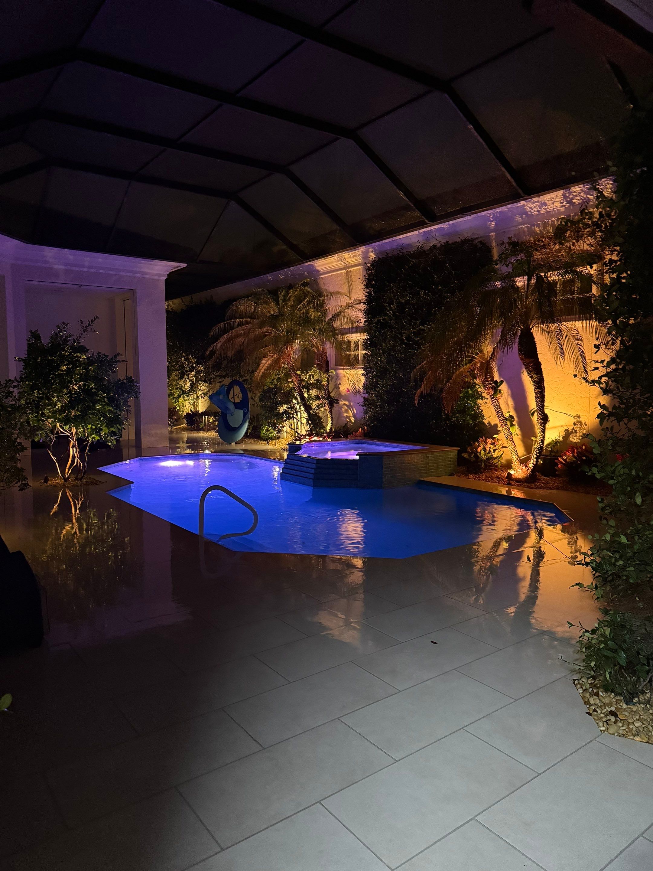 Pool Deck/Landscape/landscape lighting/pool coping/porcelain pavers/Pelican Marsh by Old Town Pavers Llc