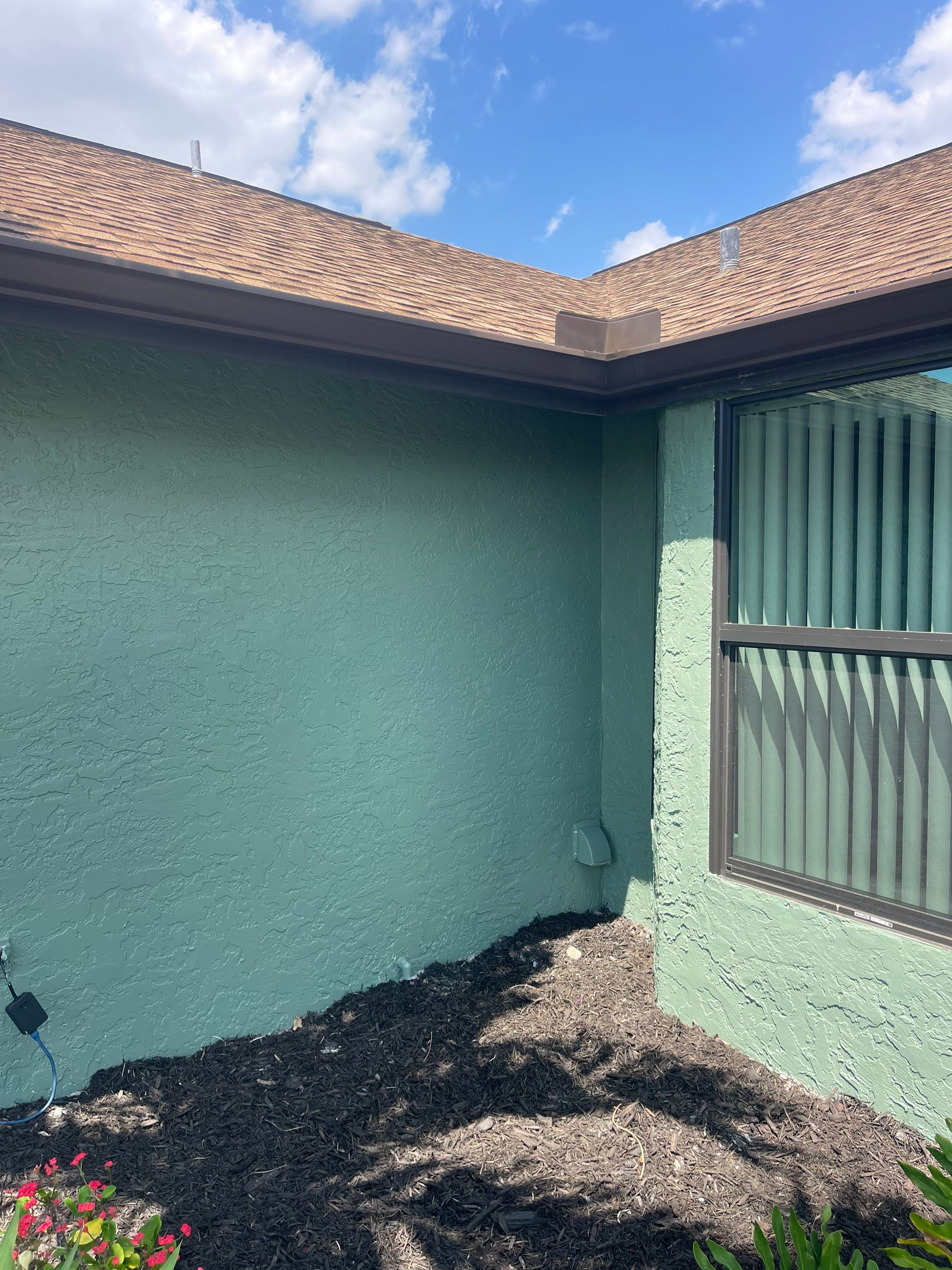 Musket Brown Seamless Gutter Installation Before Rainy Season in Cape Coral FL by Gutter Professors