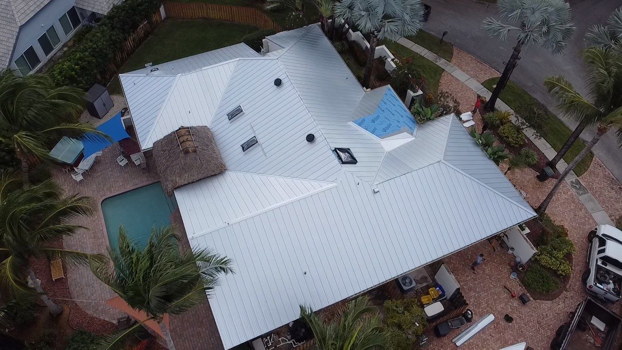 Residential Roofing Installation using 1" Nail strip metal roof by BLUES BROTHERS CONSTRUCTION CORP