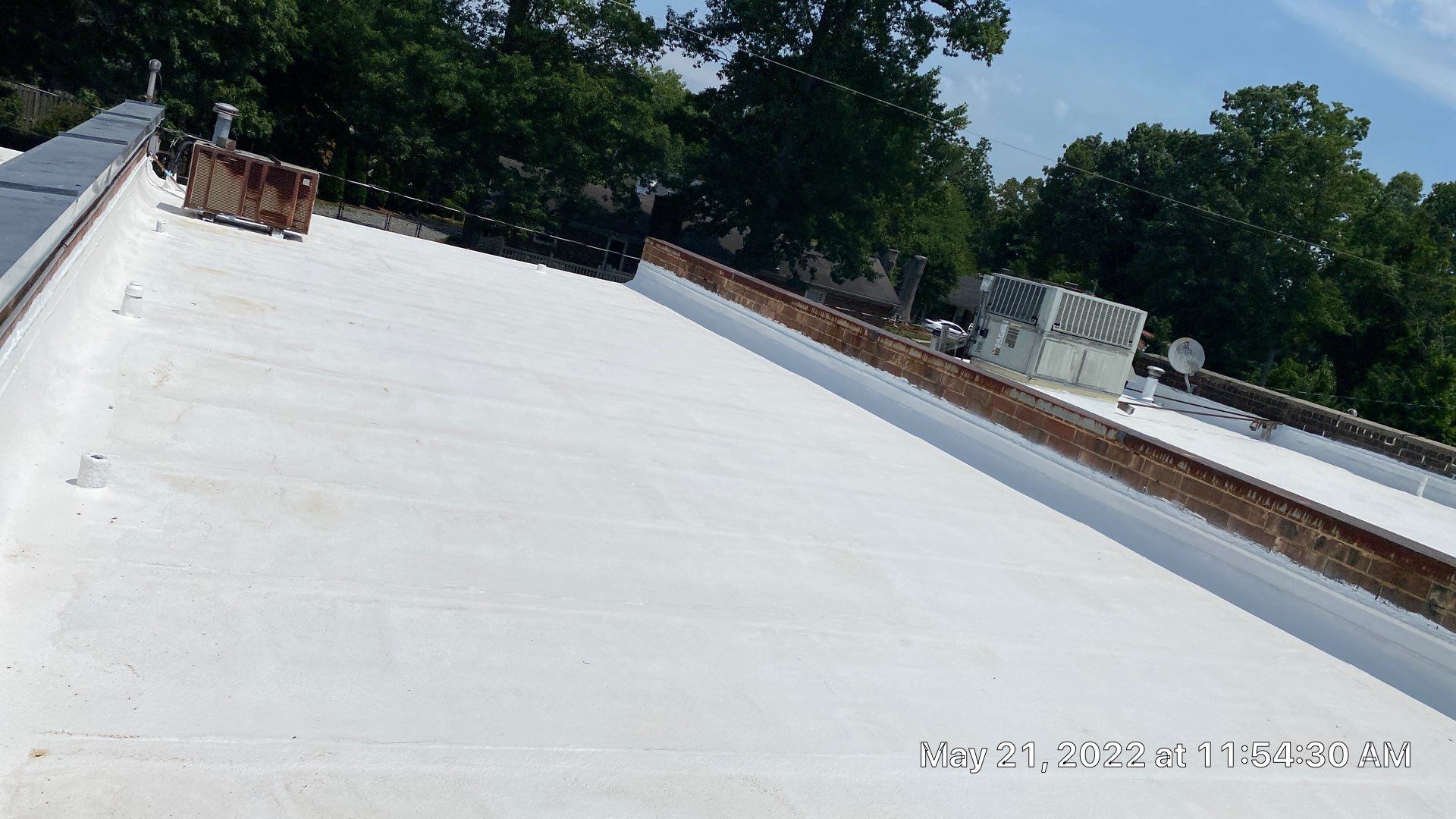 Commercial Roof Coating using Fiberseal basecoat and Silicon Topcoat by Just In Time Roofing and Restoration