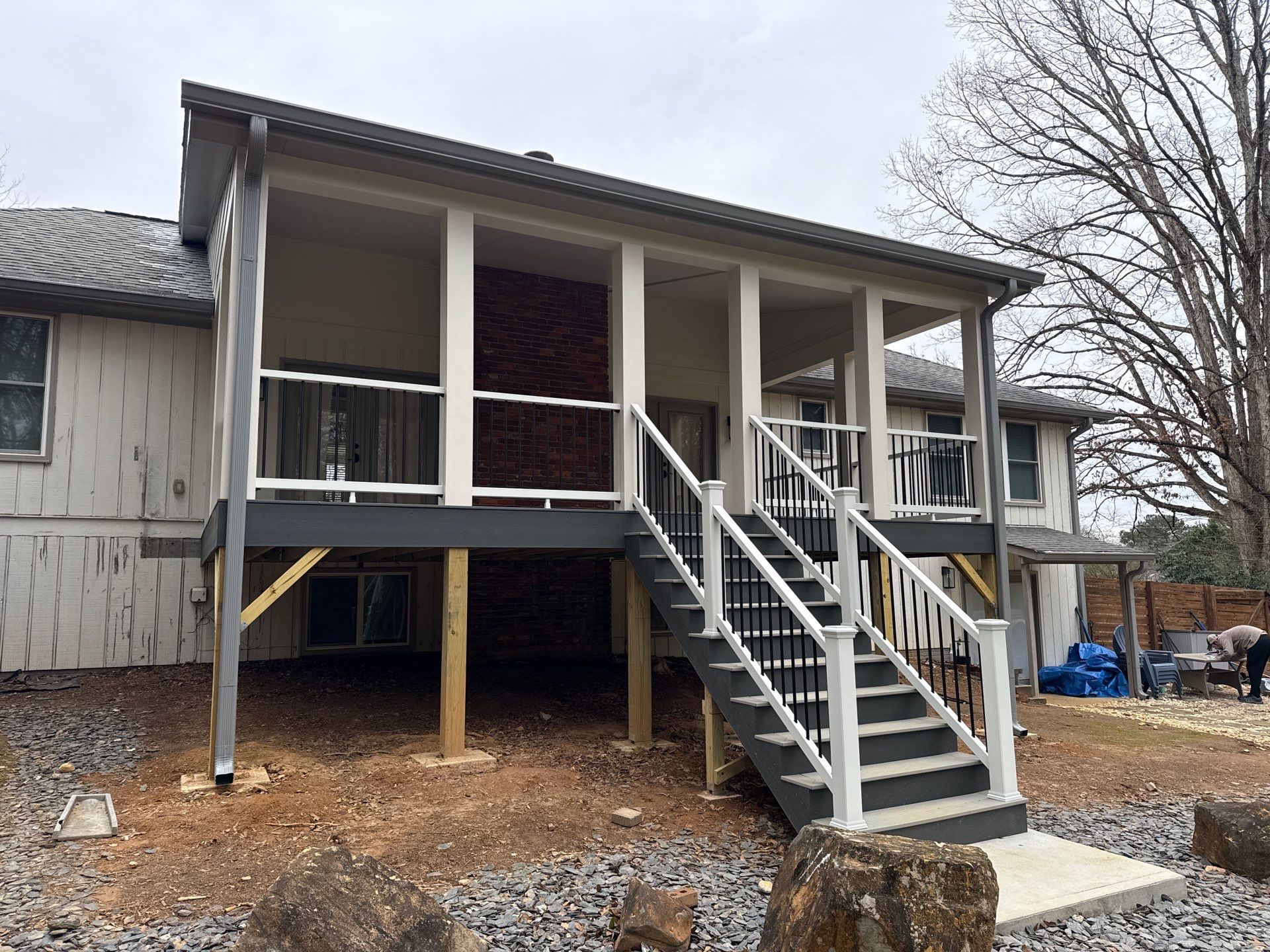 Deck and Shed Roof Style Covered Build using Trex Decking Products by Nelson Exteriors 