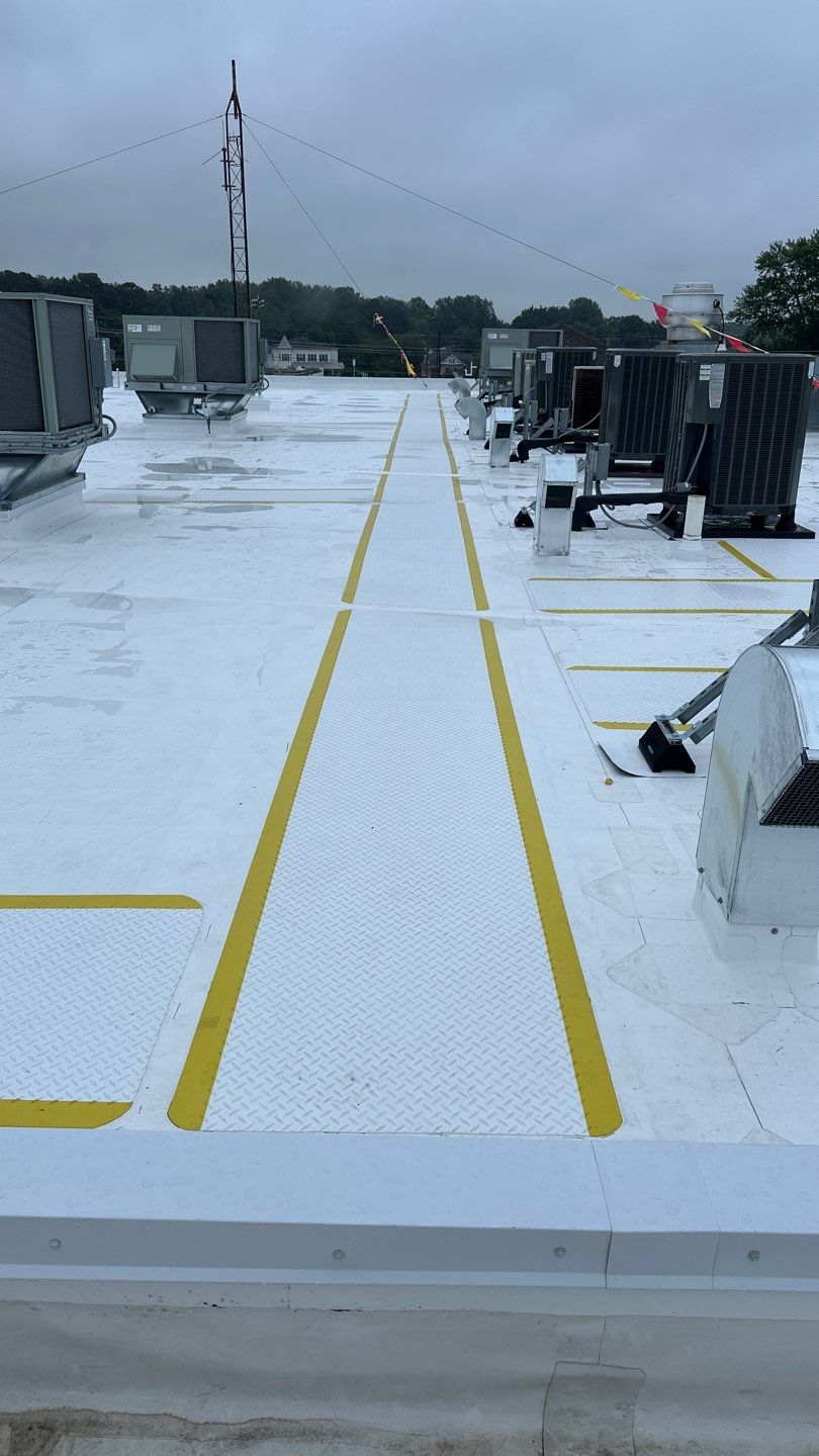 Roof Installation using Silicone TPO by ExteriorPros
