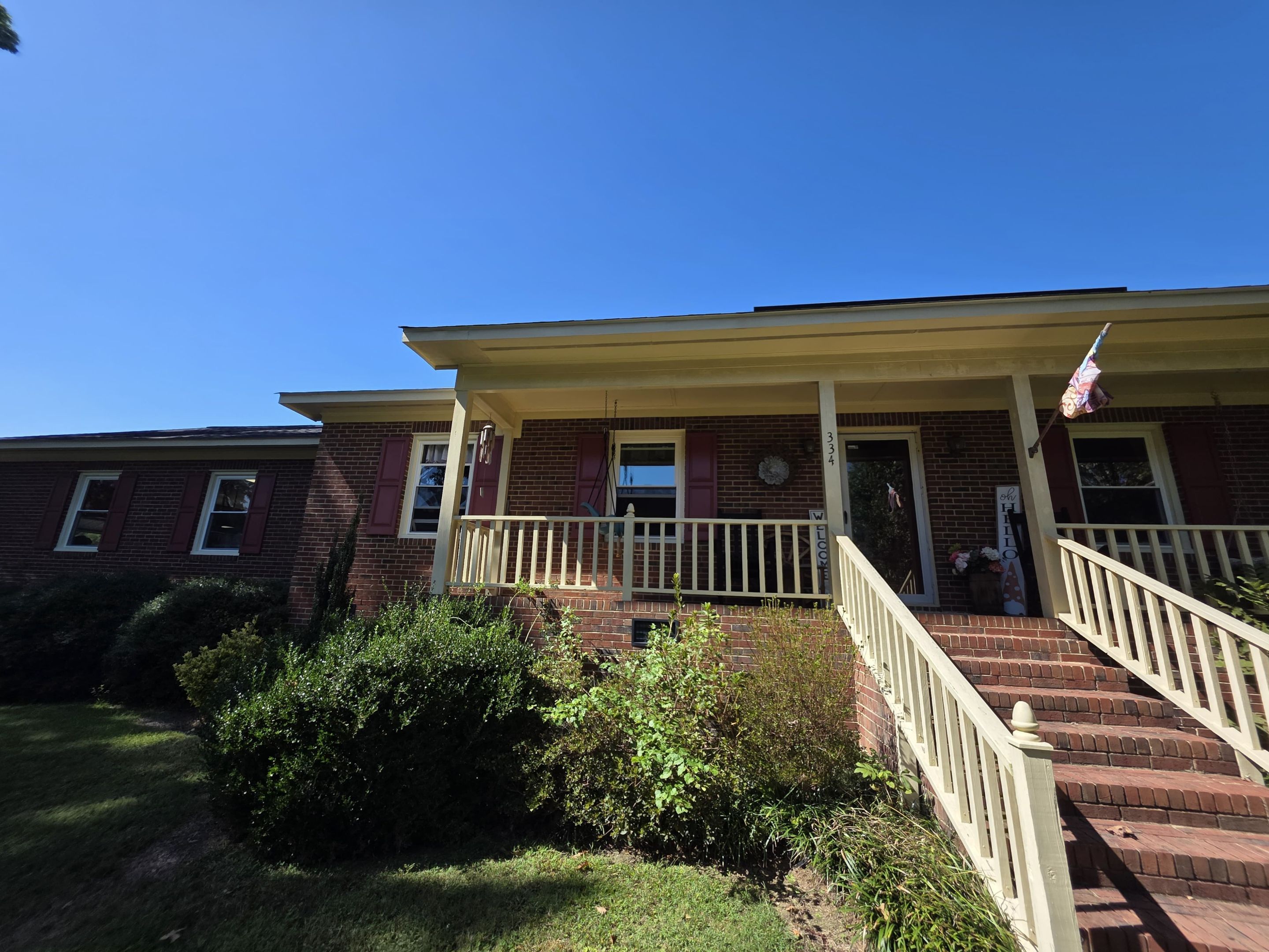 Full Residential Window Replacement for Zebulon Brick Home by The Remodeling Company