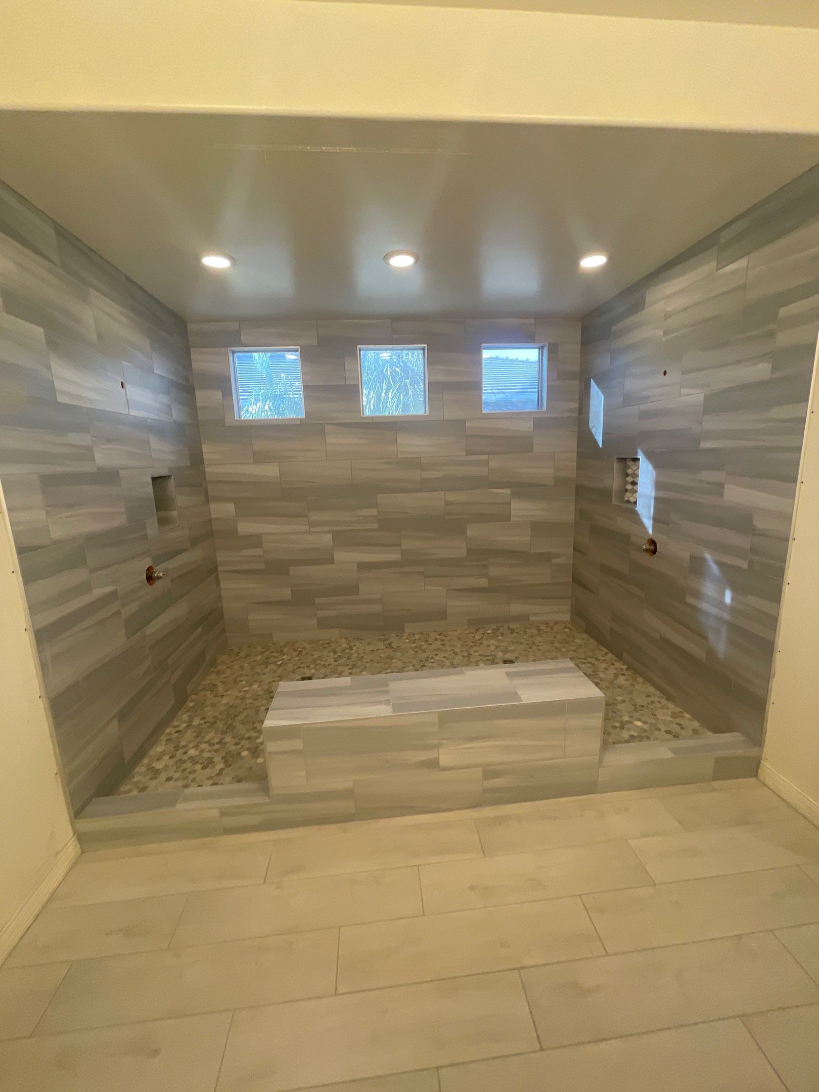 Wood Look Tile Floors and an Extra Large Shower  by Footprints Floors of Chandler 