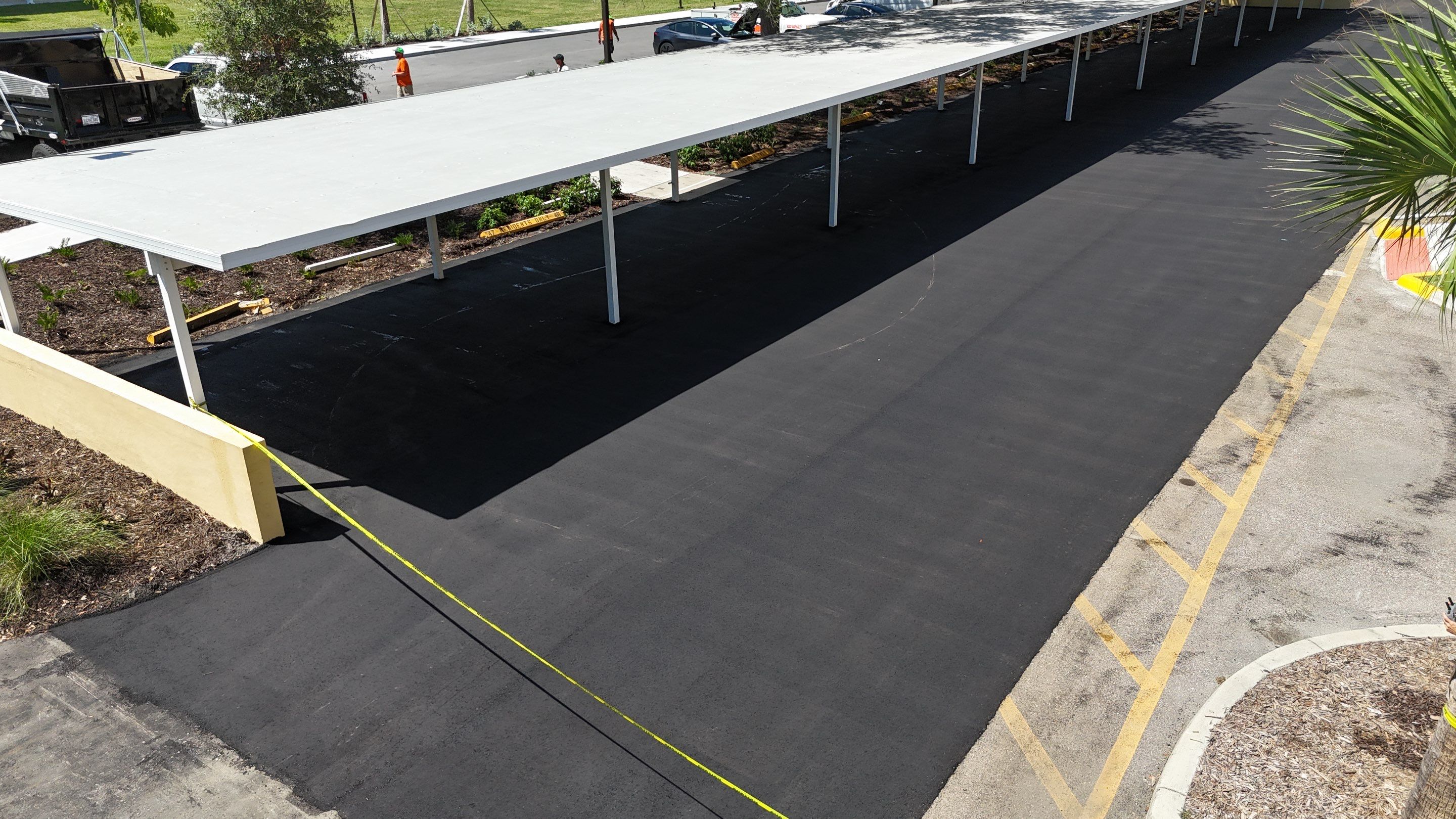 Comprehensive Parking Lot Mill and Overlay with Custom Line Striping in Venice by Everline Coatings & Services - Southwest FL