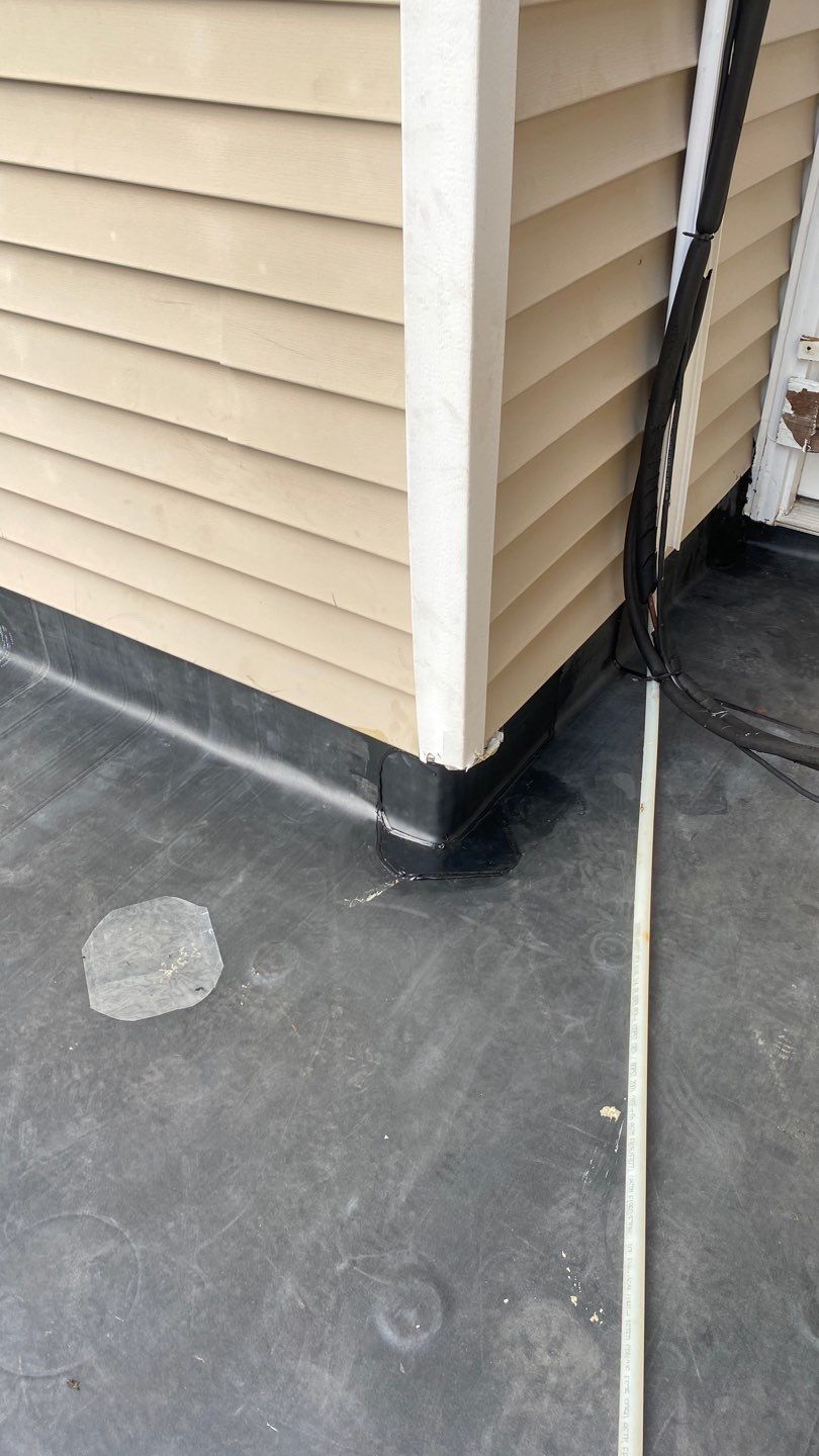 Siding Repair using Certainteed Mainsteet D4 and EPDM roof under deck by A Plus Exterior