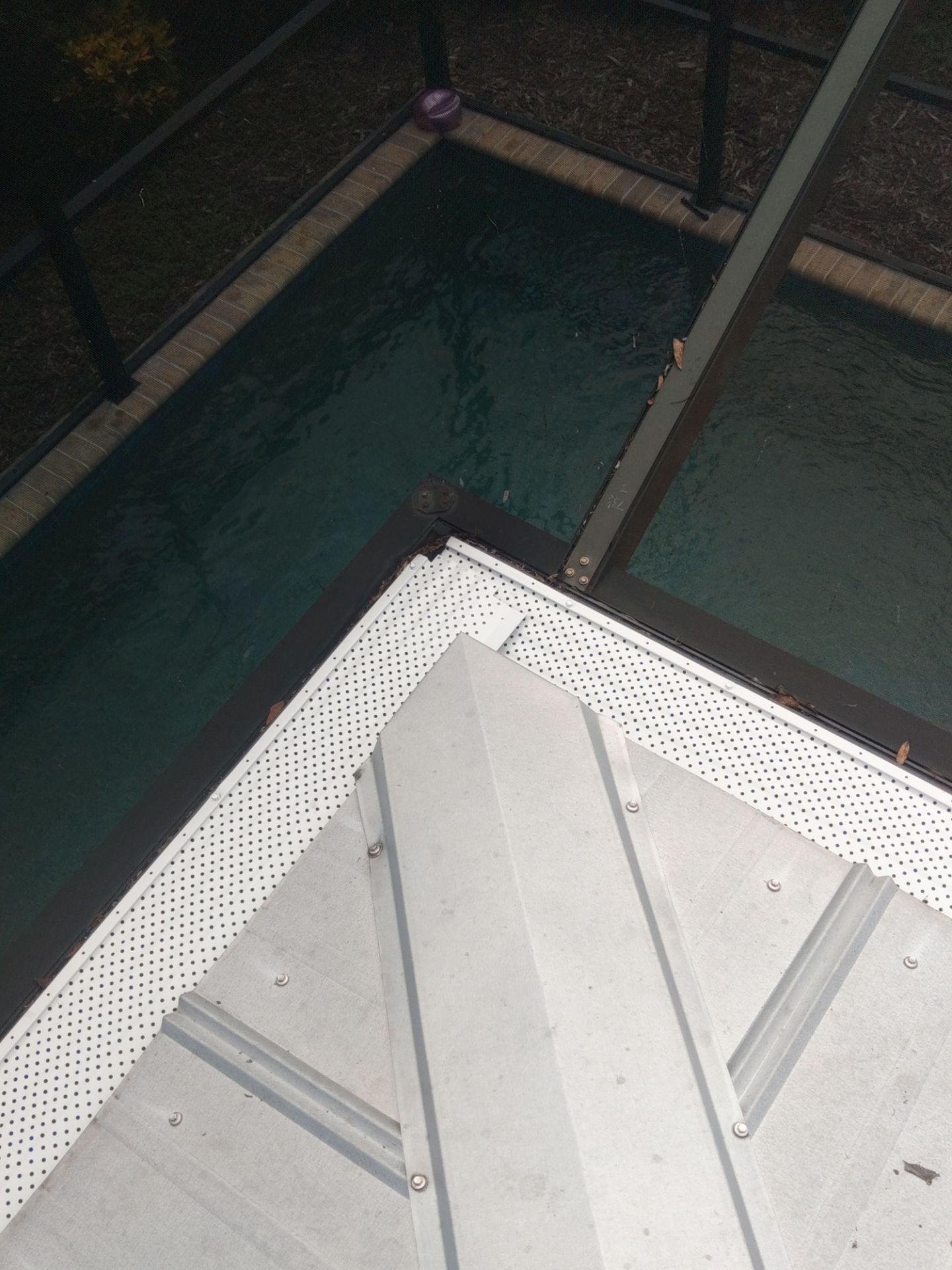 Gutter guards installation combined with gutter cleaning in Sarasota, FL by Gutter Professors