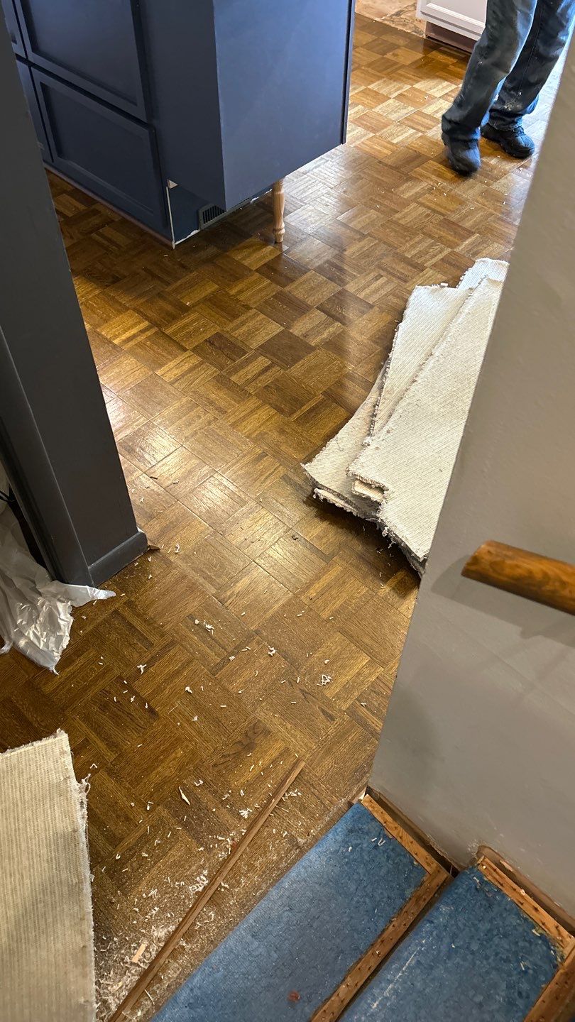 Parquet floor and stair treads by Footprints Floors of Nashville