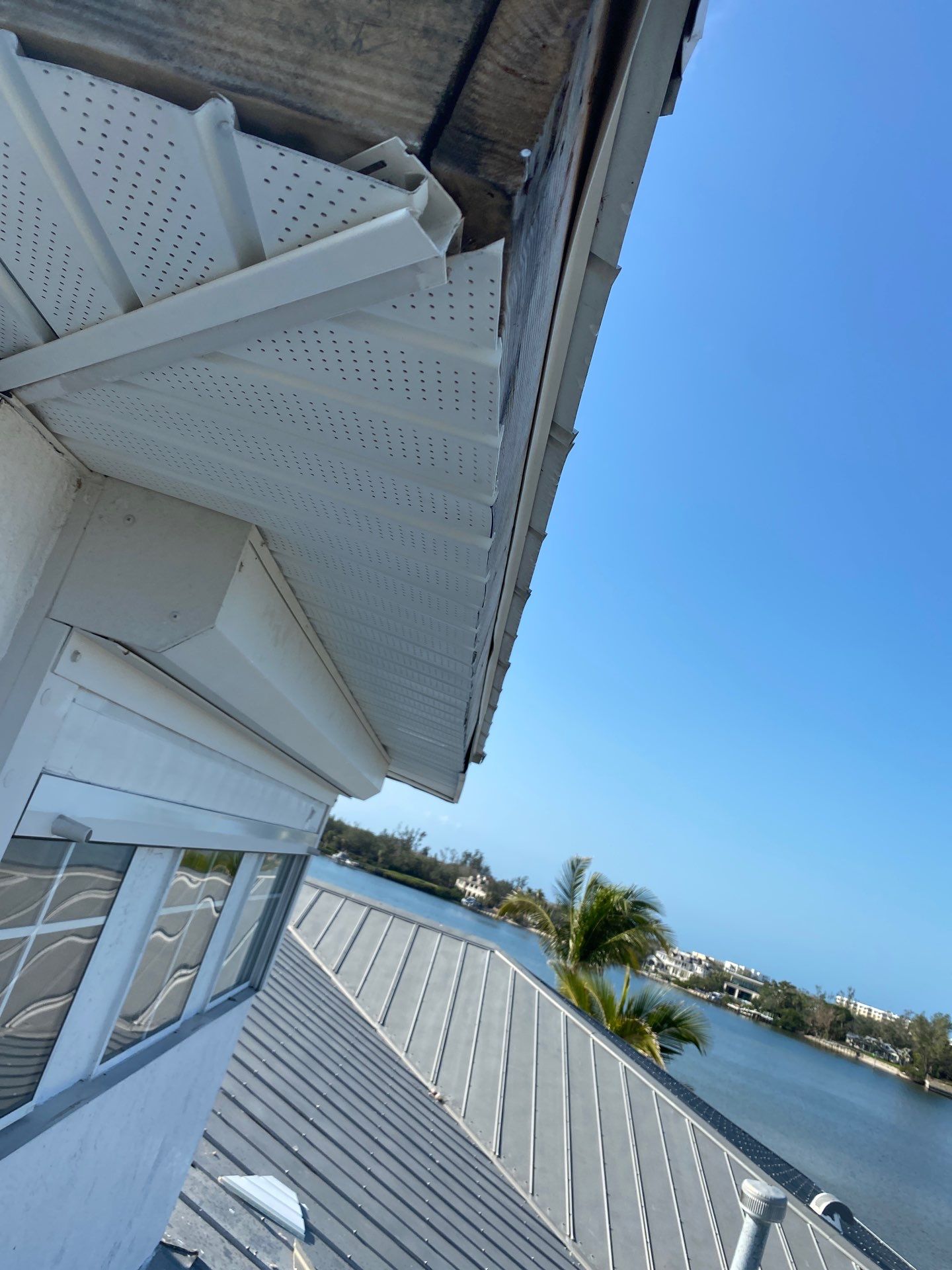 Seamless Gutter Installation for Beach Homes in Sarasota FL by Gutter Professors