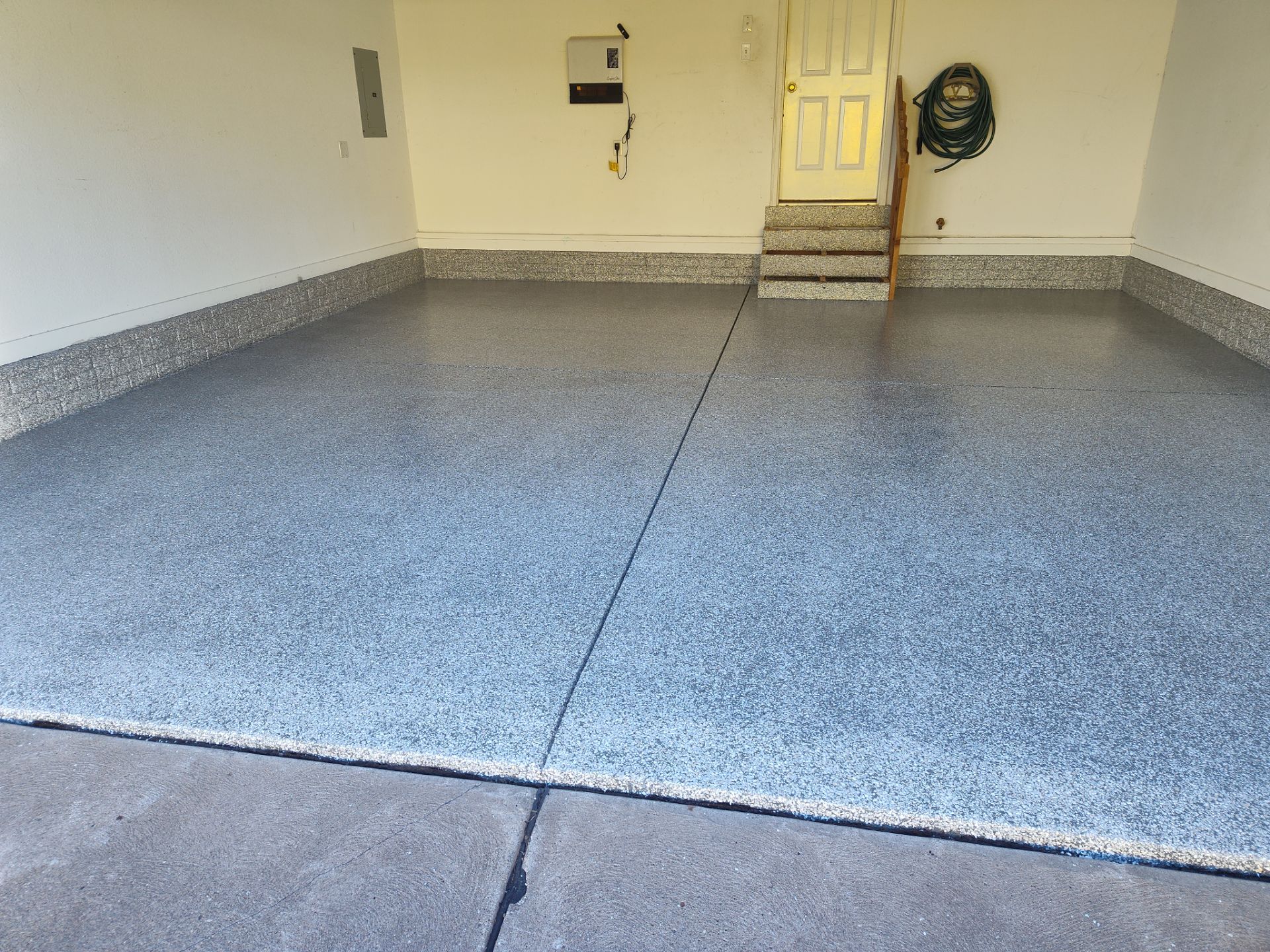 Garage Floor Coating using Polyaspartic by Revival Concrete Coatings, LLC