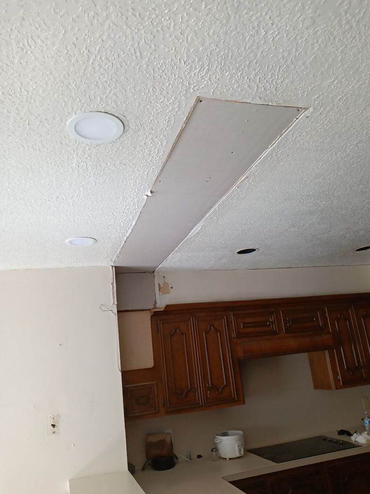 Interior and exterior painting project by Roof Concepts Construction