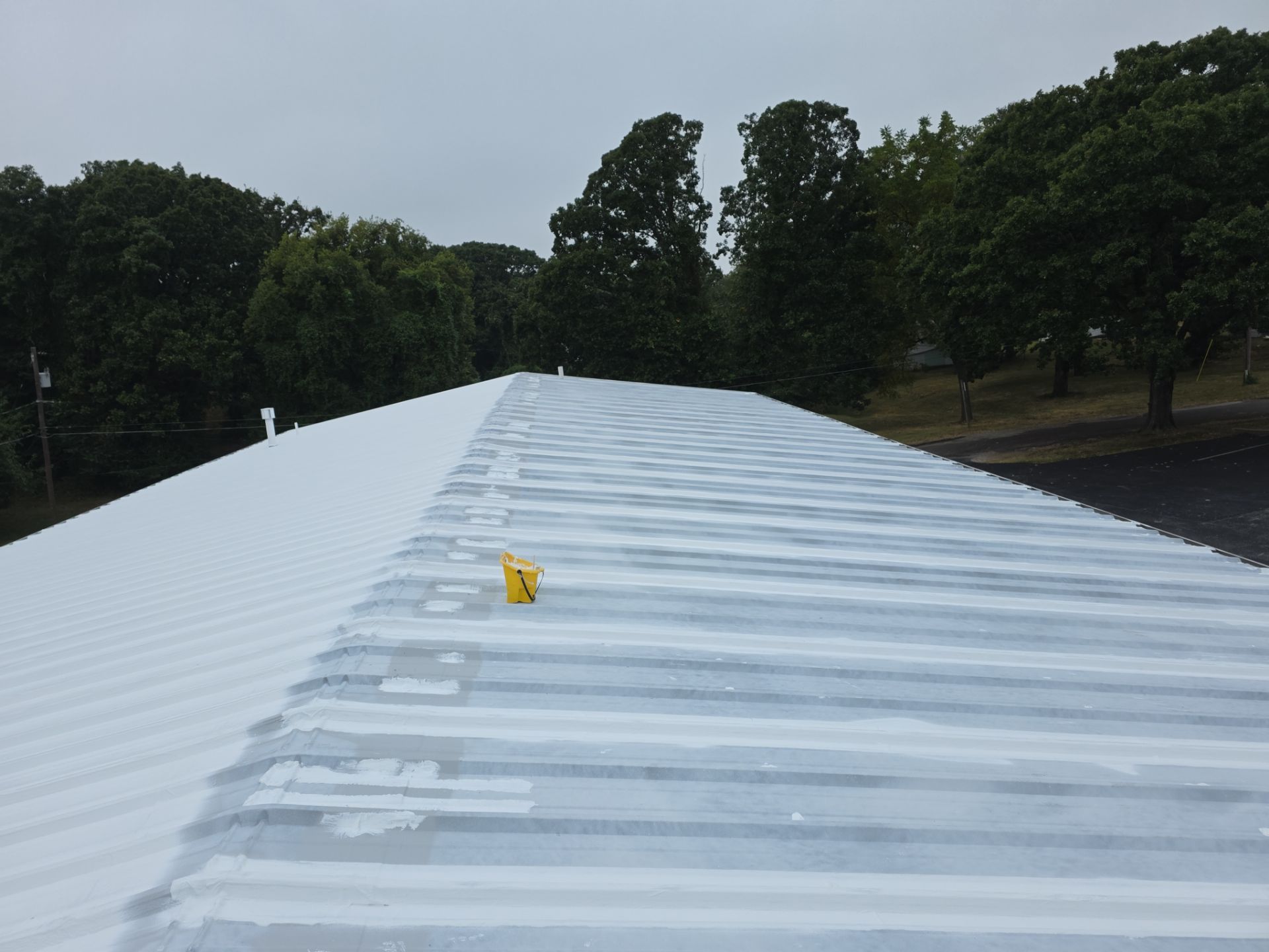 Commercial Roofing Install - Metal Coatings Restoration System  - Color White  by Titan Commercial & Residential Roofing 